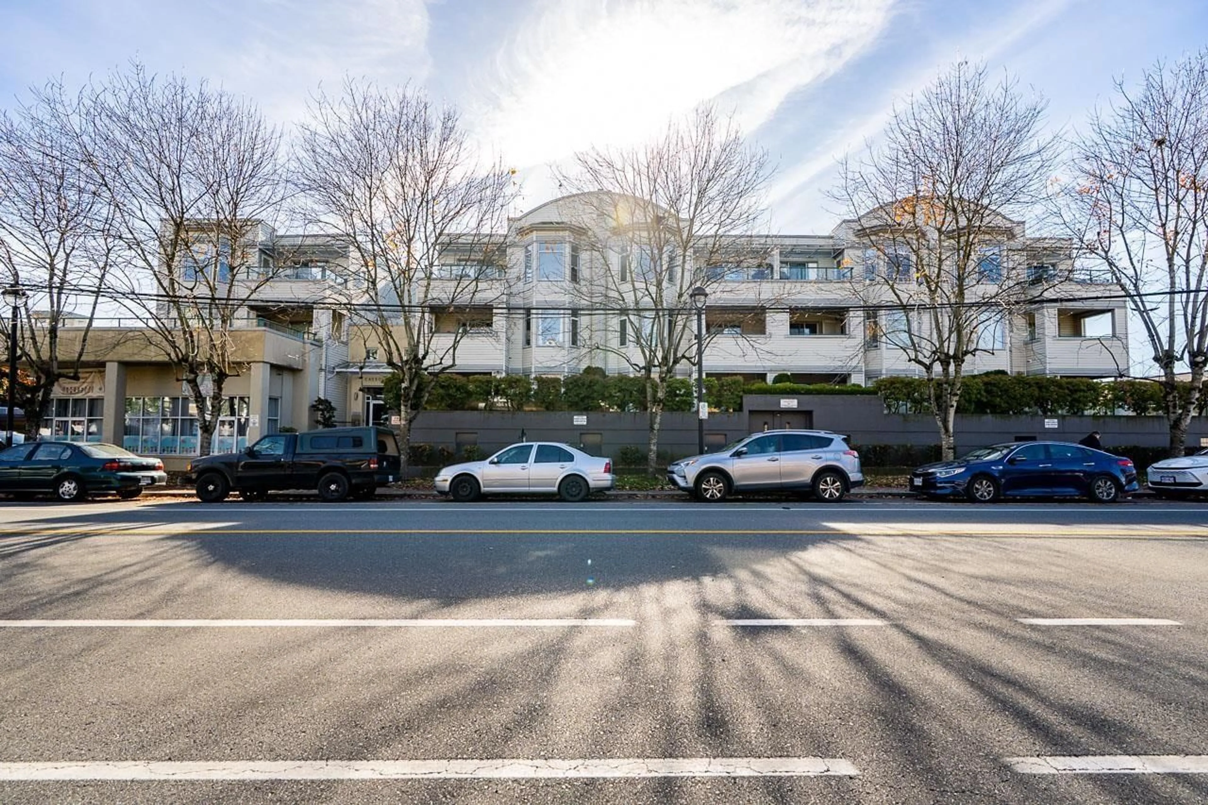 A pic from outside/outdoor area/front of a property/back of a property/a pic from drone, street for 213 - 20680 56 AVENUE, Langley British Columbia V3A3Z1