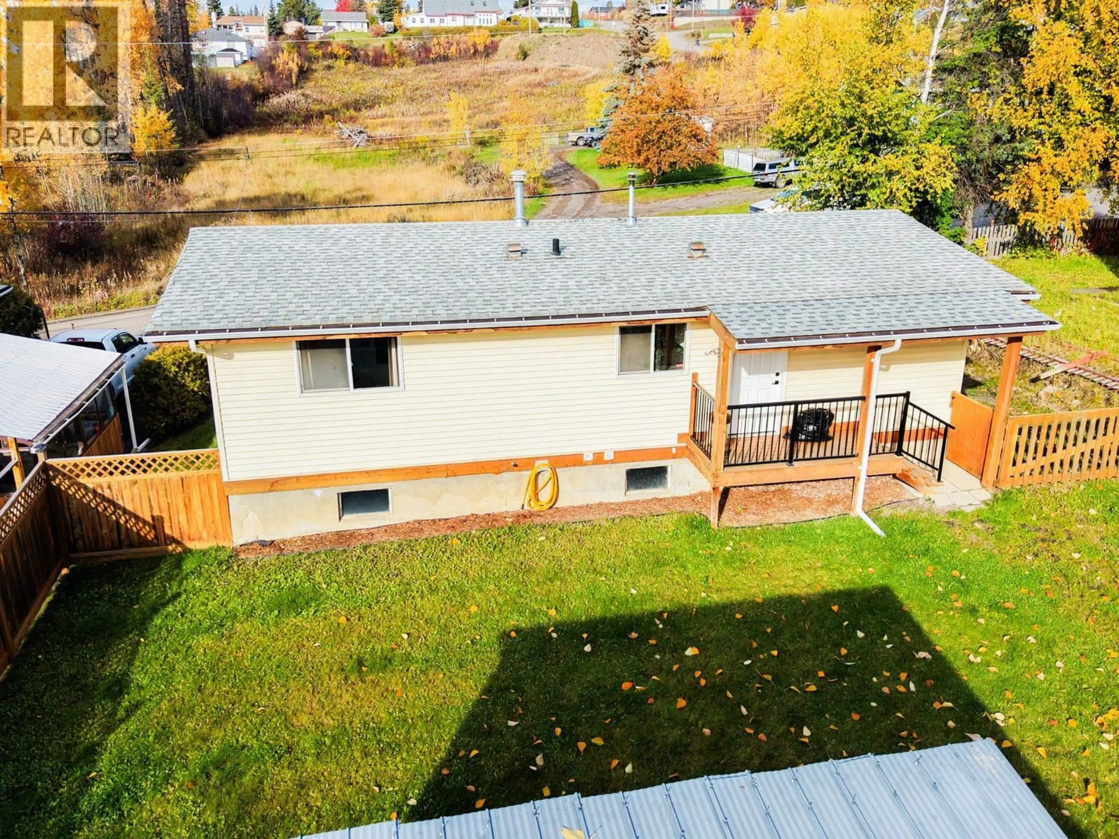 A pic from outside/outdoor area/front of a property/back of a property/a pic from drone, unknown for 328 1ST AVENUE, Burns Lake British Columbia V0J1E0
