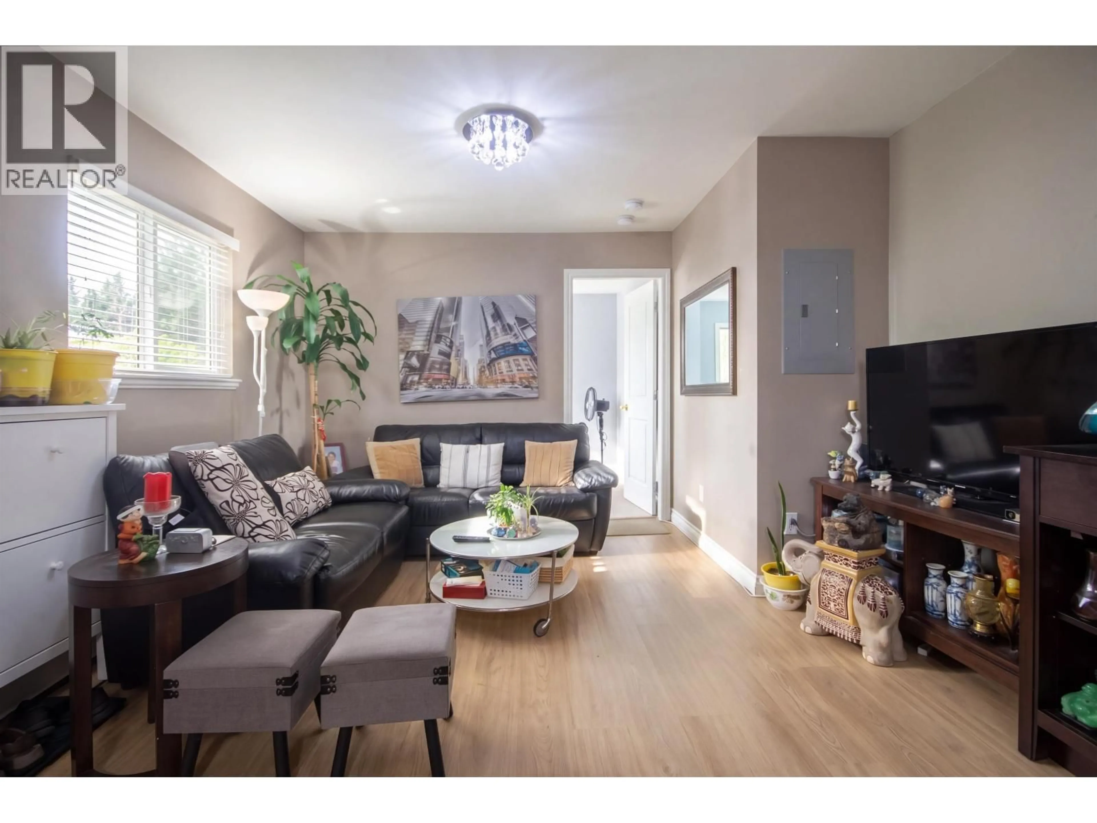 Living room with furniture, wood/laminate floor for 213 BERNATCHEY STREET, Coquitlam British Columbia V3K4C2