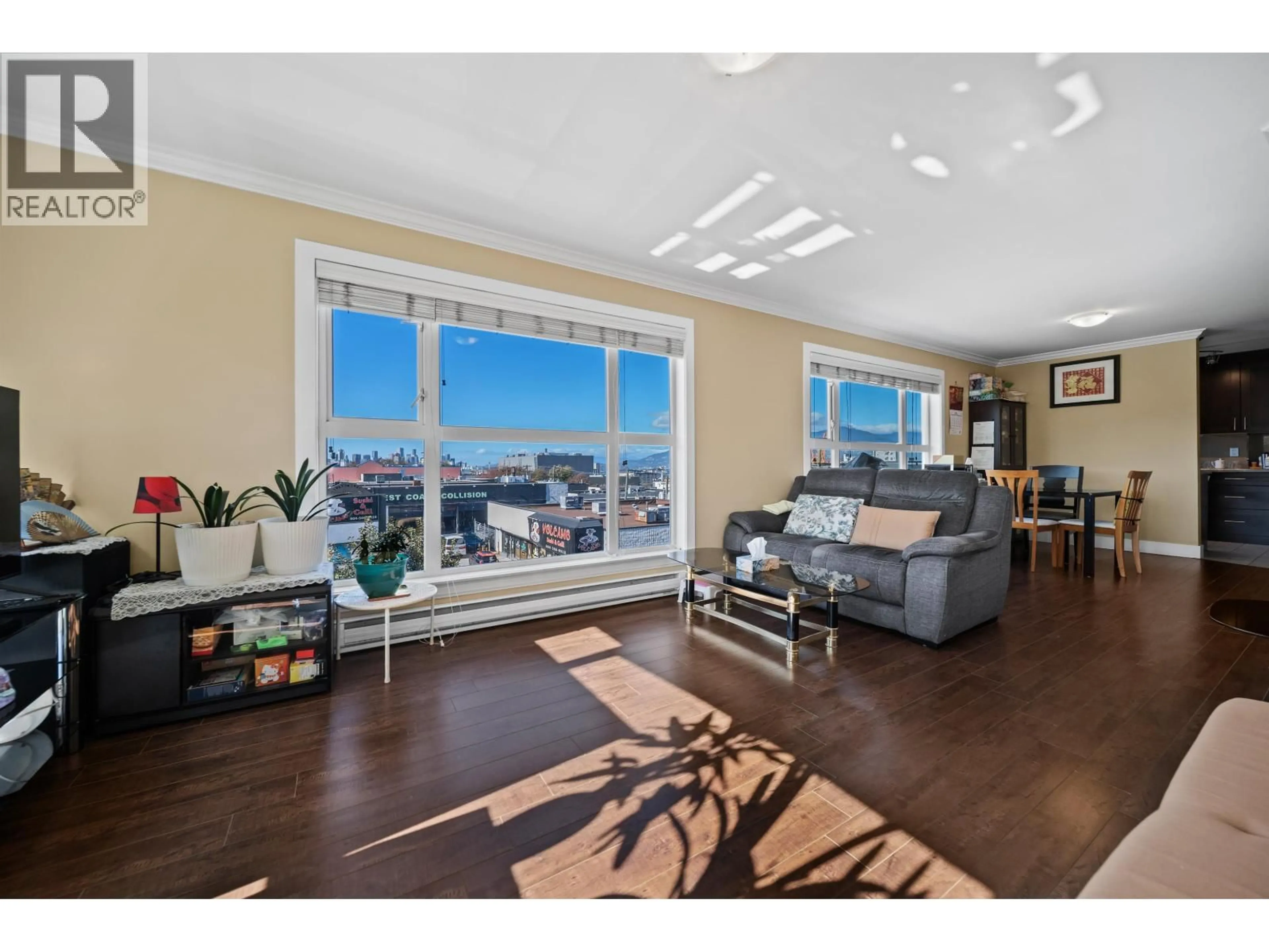 Living room with furniture, wood/laminate floor for 302 - 2009 HASTINGS STREET, Vancouver British Columbia V5L1T9