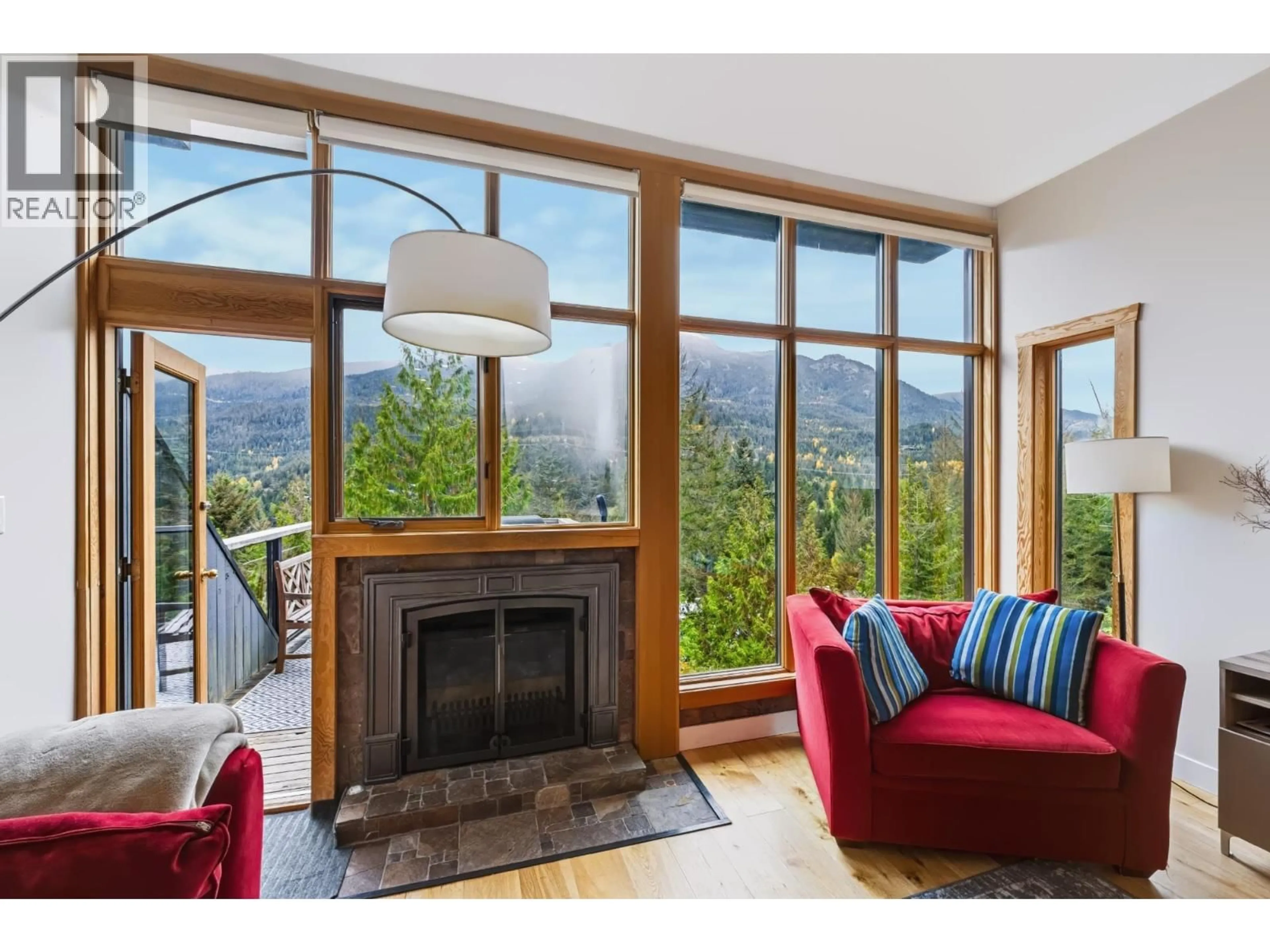 Living room with furniture, wood/laminate floor for 7 - 2221 GONDOLA WAY, Whistler British Columbia V8E0M8