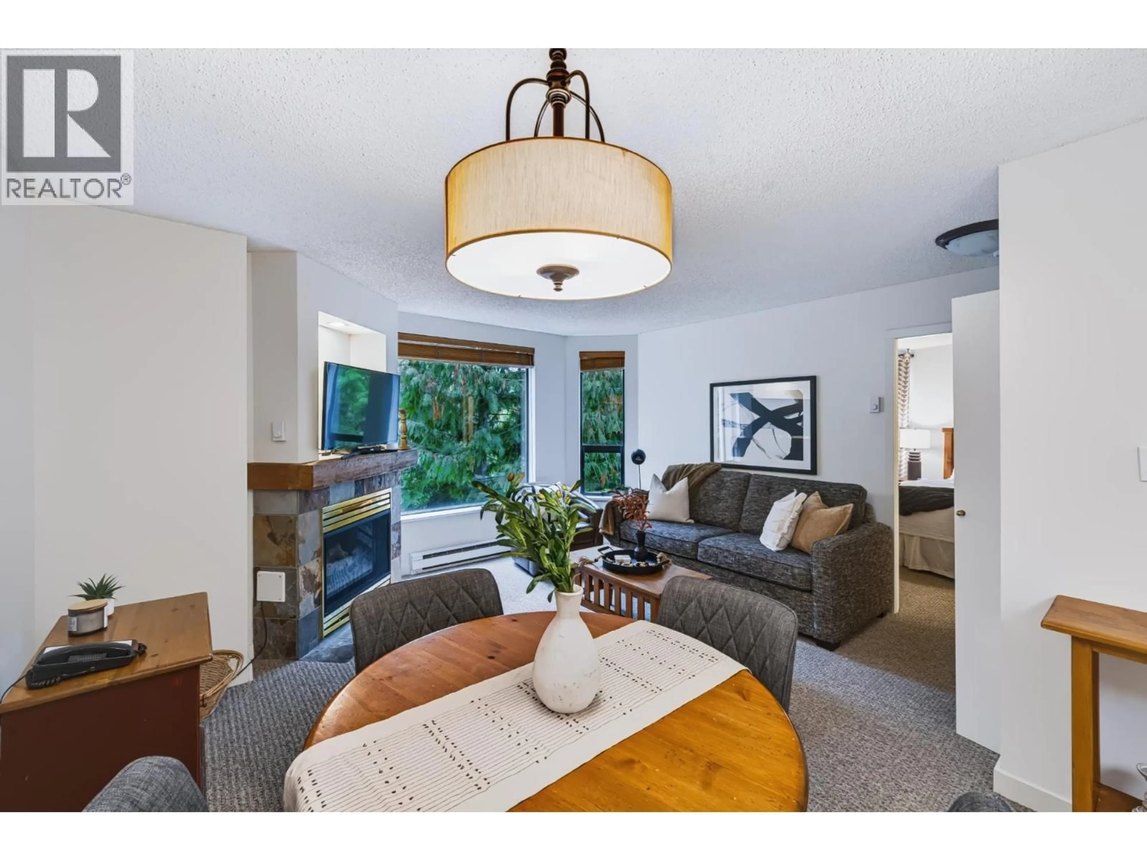 Living room with furniture, unknown for 207 - 4809 SPEARHEAD DRIVE, Whistler British Columbia V0N1B4