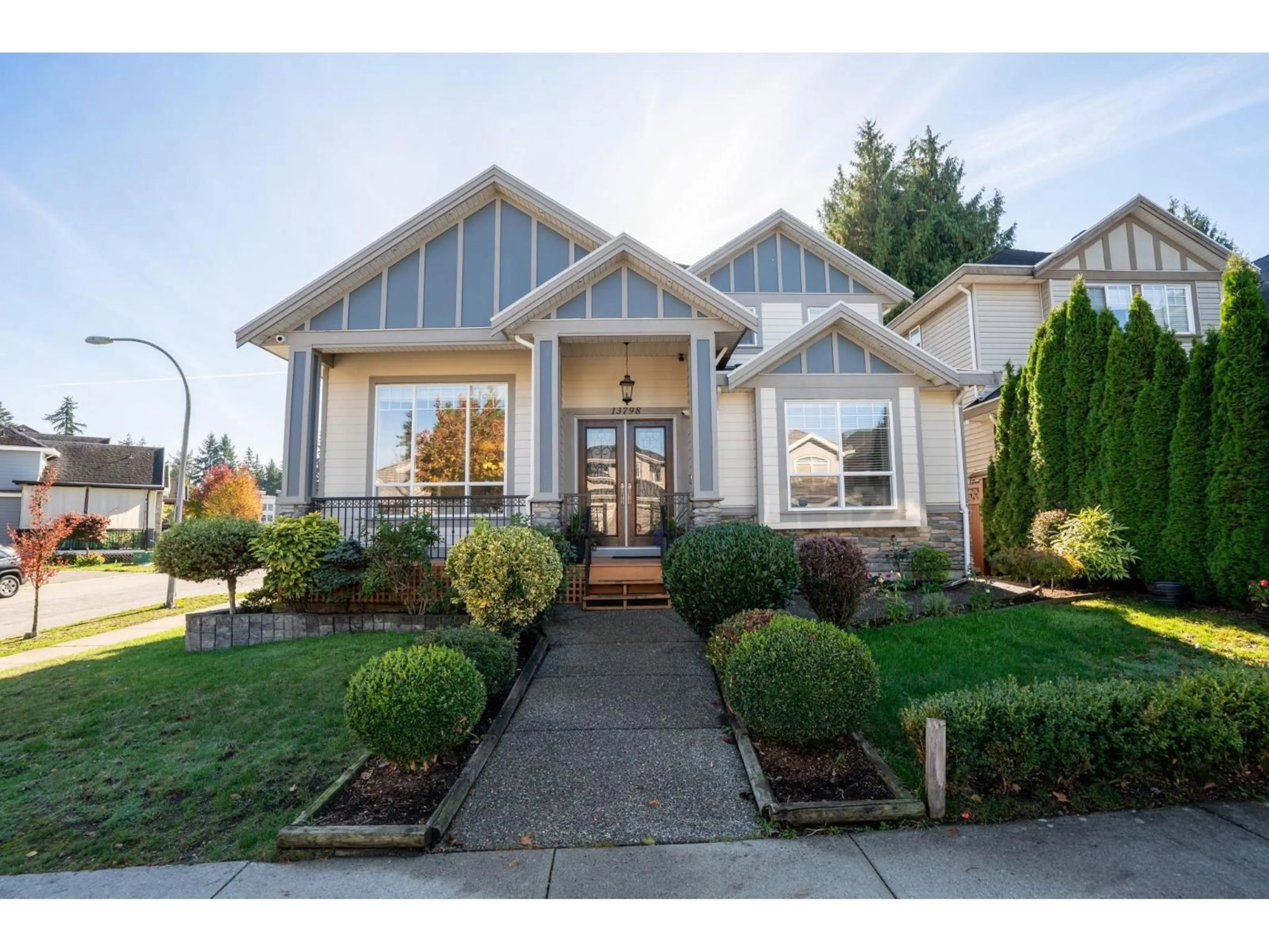 Home with vinyl exterior material, street for 13798 58A AVENUE, Surrey British Columbia V3X1G7