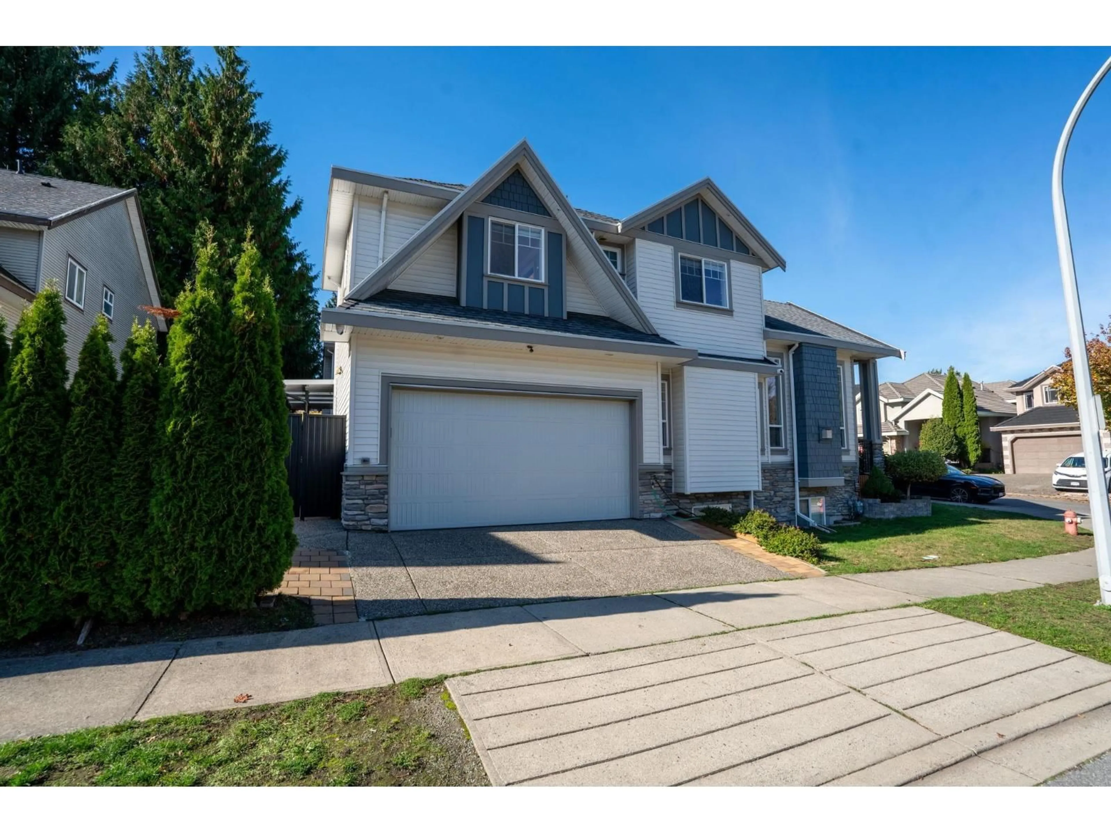 Home with vinyl exterior material, street for 13798 58A AVENUE, Surrey British Columbia V3X1G7