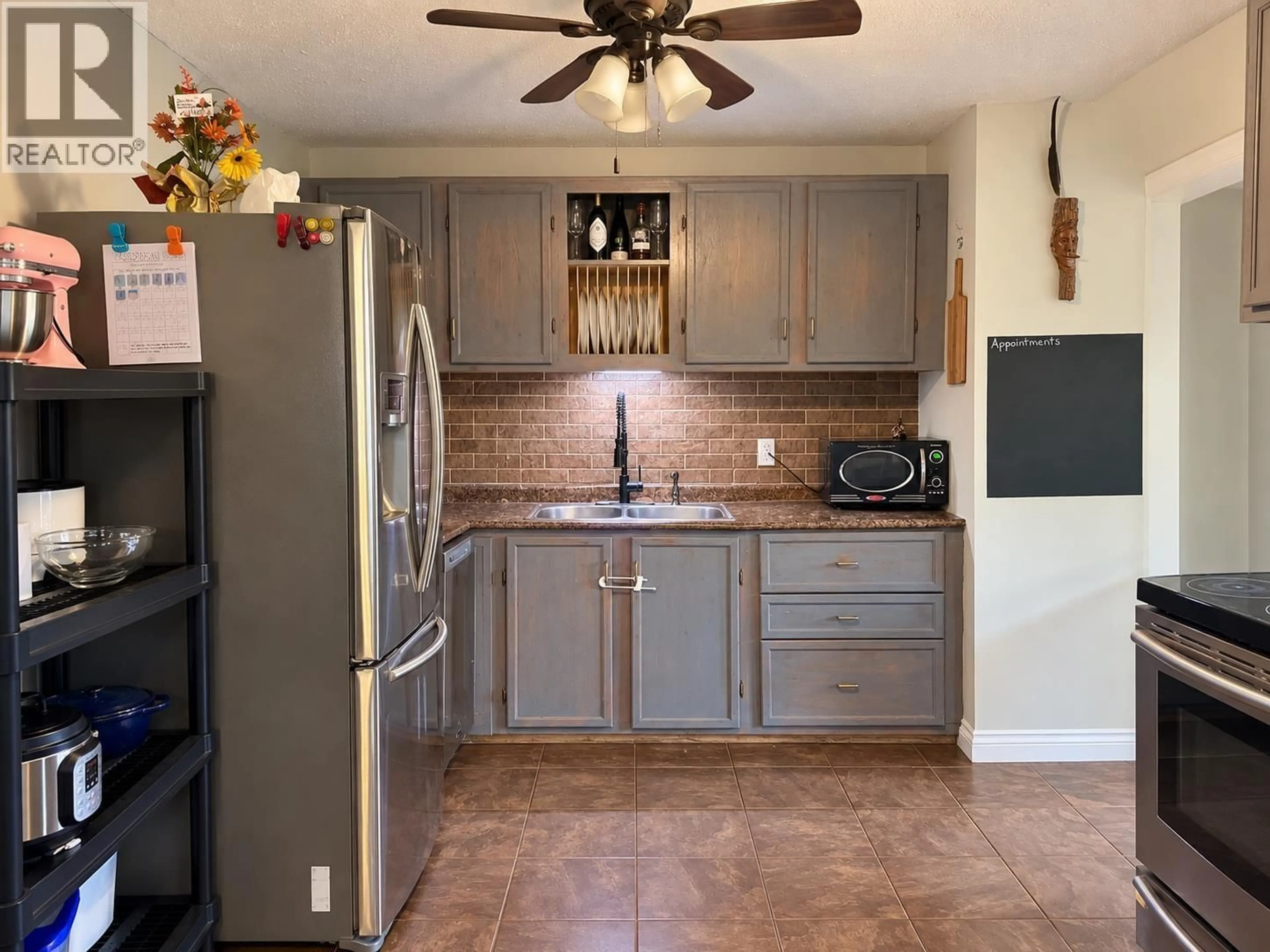Open concept kitchen, ceramic/tile floor for 65 BITTERN STREET, Kitimat British Columbia V8C1R4