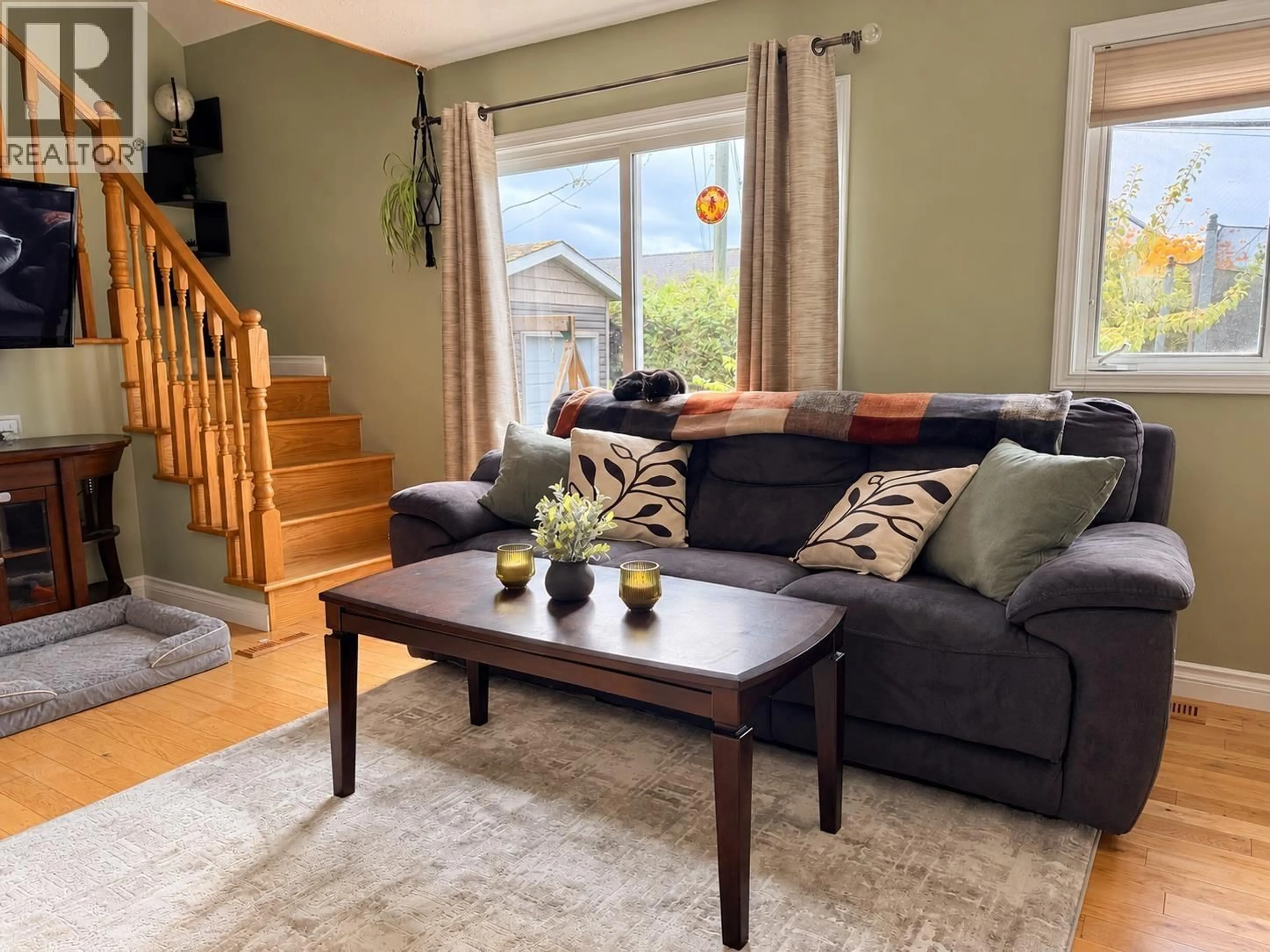 Living room with furniture, wood/laminate floor for 65 BITTERN STREET, Kitimat British Columbia V8C1R4