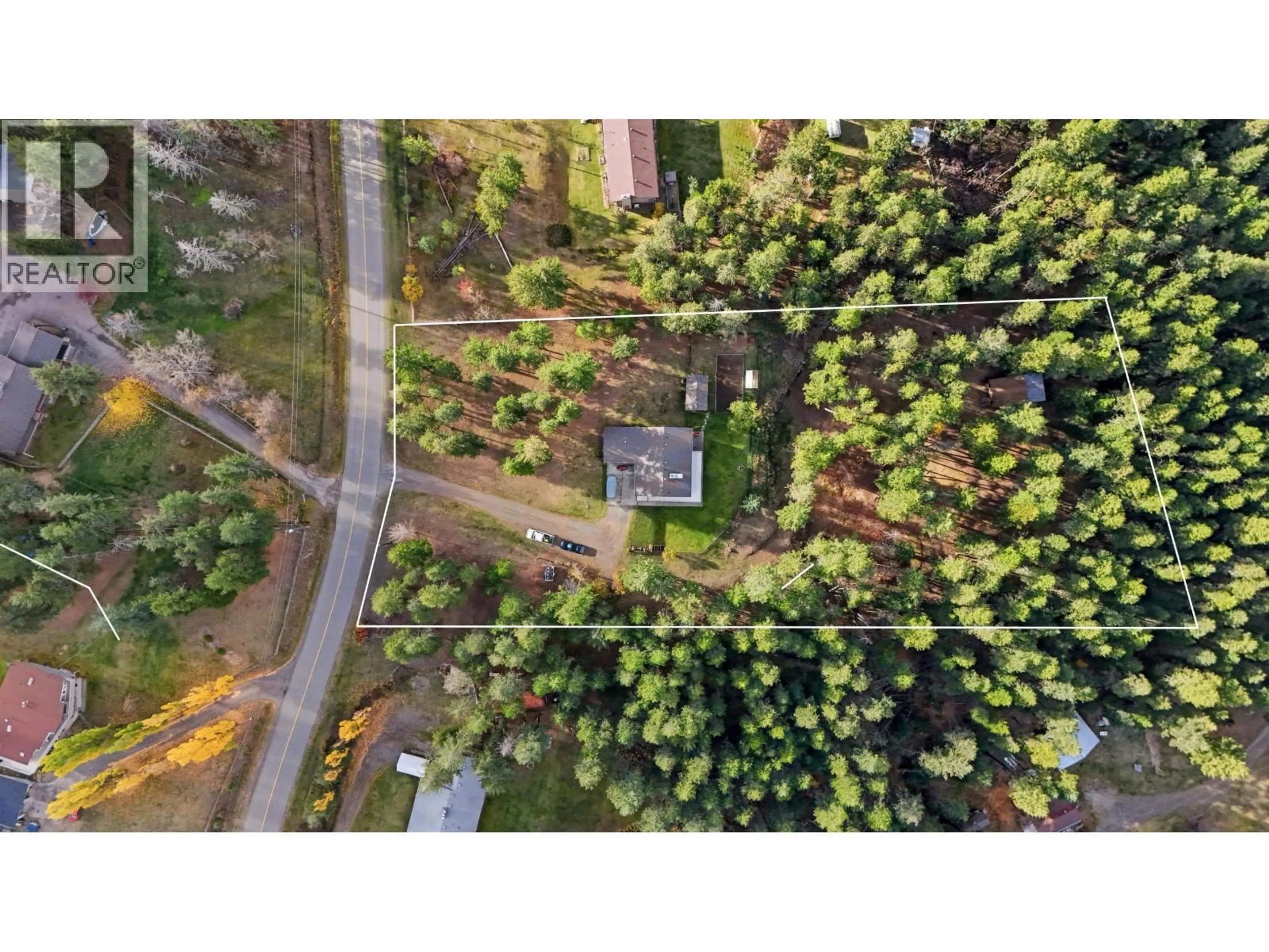 A pic from outside/outdoor area/front of a property/back of a property/a pic from drone, forest/trees view for 754 ROBERTS DRIVE, Williams Lake British Columbia V2G5K1