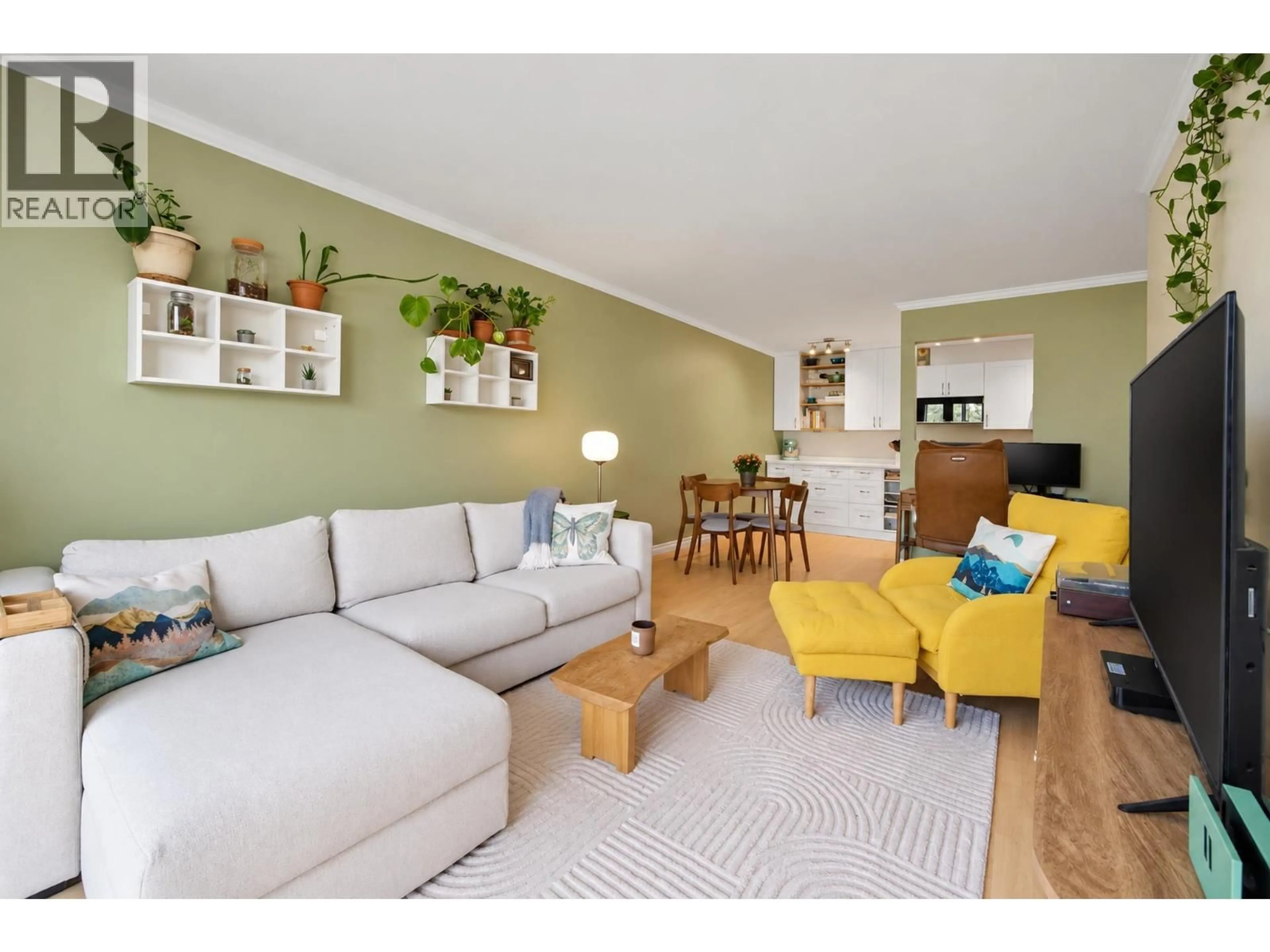Living room with furniture, wood/laminate floor for 203 - 36 14TH AVENUE, Vancouver British Columbia V5T4C9