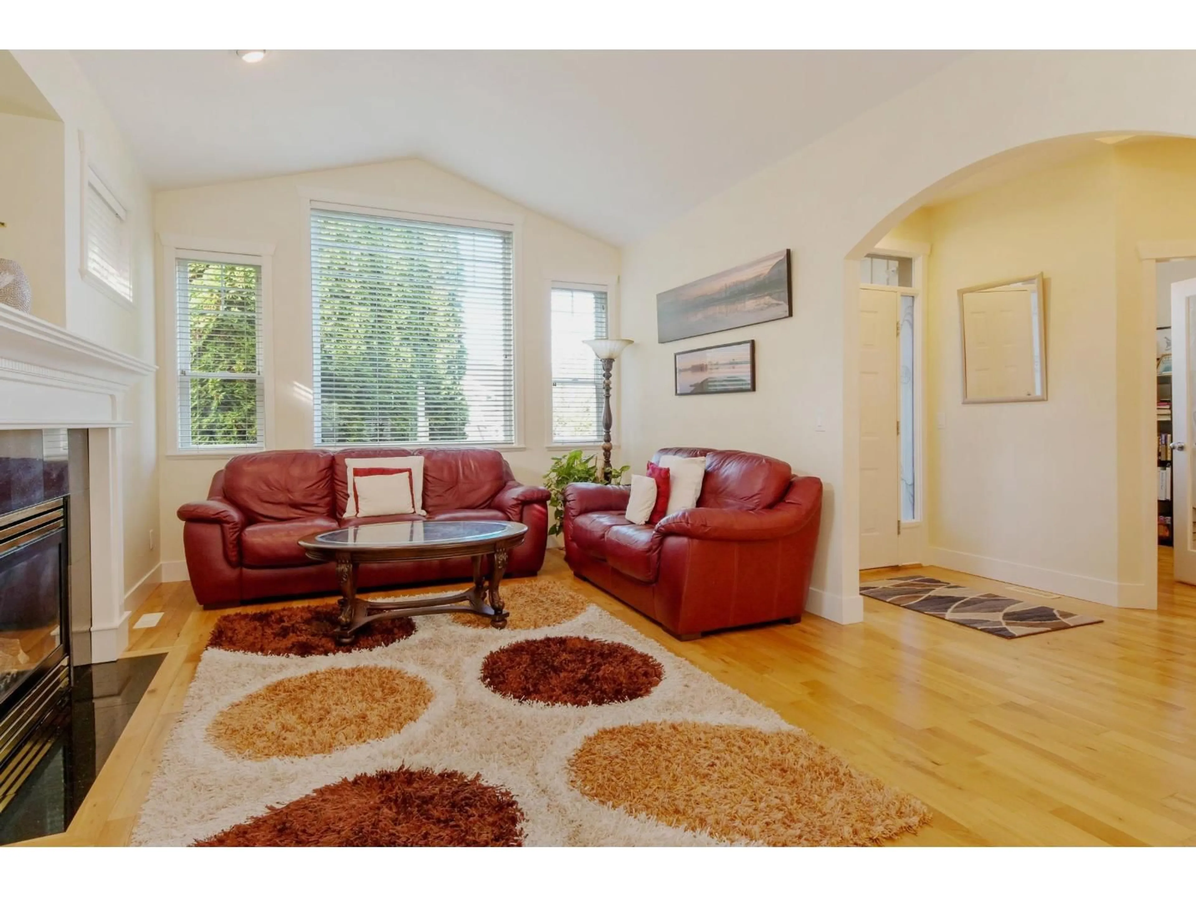 Living room with furniture, wood/laminate floor for 6122 164 STREET, Surrey British Columbia V3S3V8