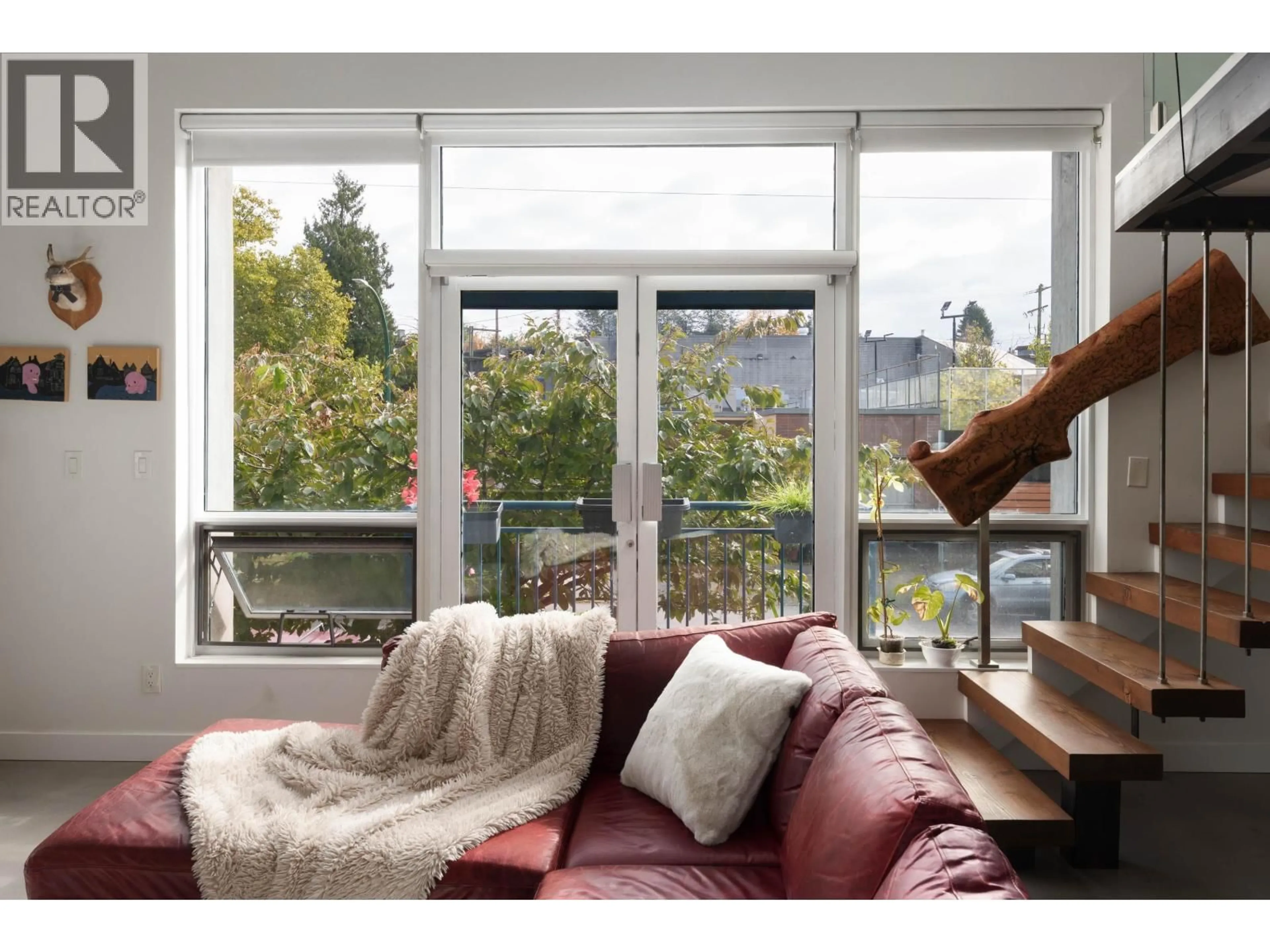 Living room with furniture, wood/laminate floor for 207 - 2001 WALL STREET, Vancouver British Columbia V5L5E4