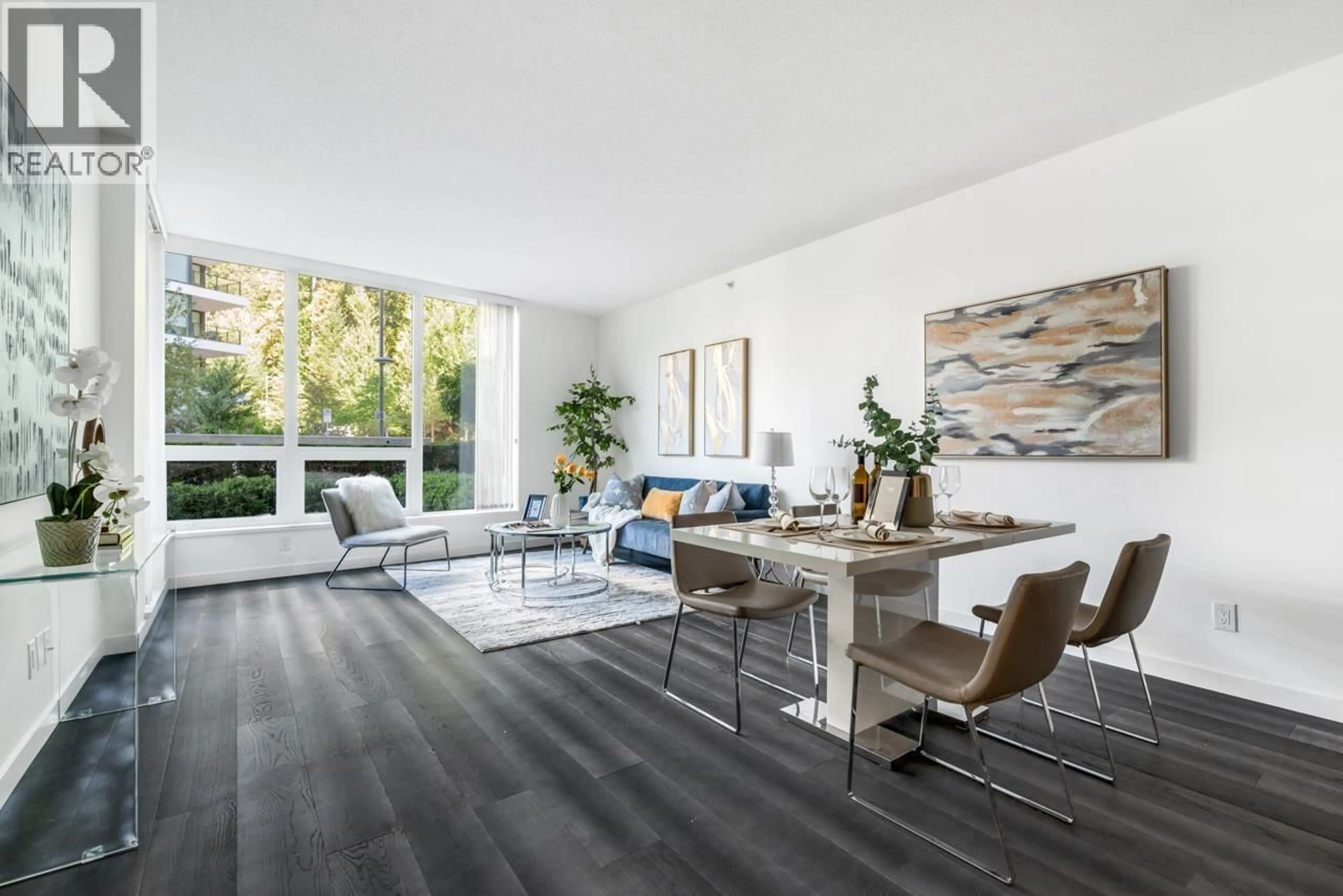 Living room with furniture, wood/laminate floor for 101 - 5628 BIRNEY AVENUE, Vancouver British Columbia V6S0H7