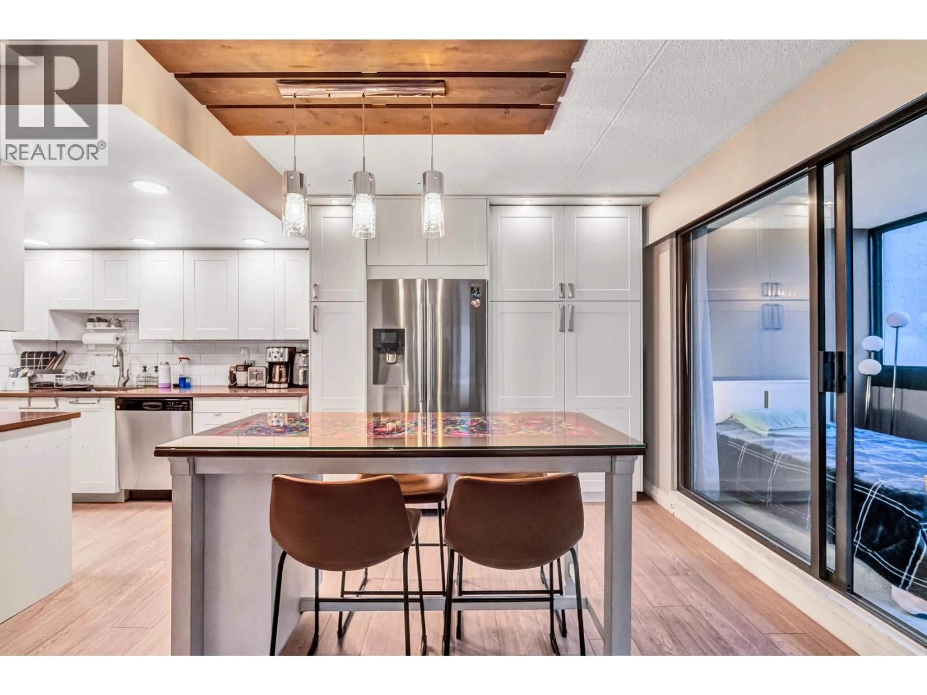 Open concept kitchen, wood/laminate floor for 1204 - 1515 EASTERN AVENUE, North Vancouver British Columbia V7L4R2