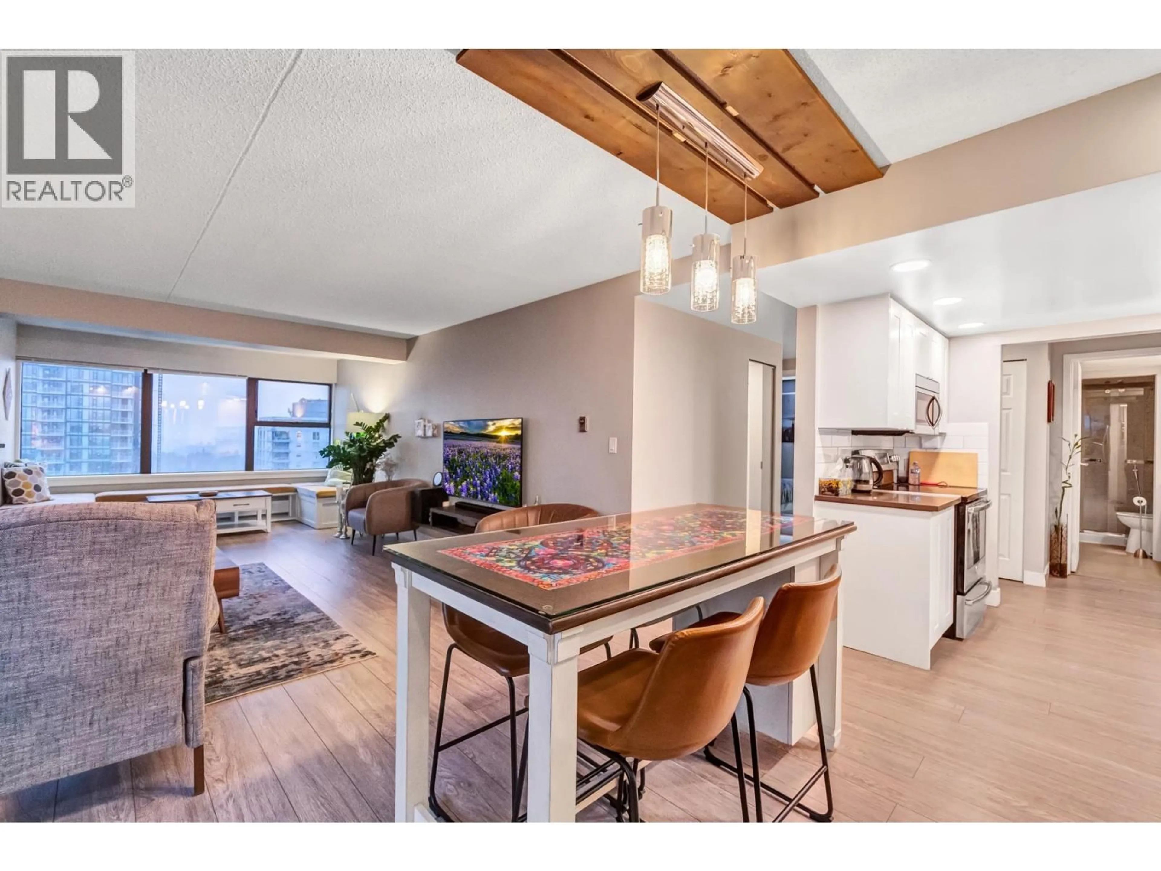 Open concept kitchen, wood/laminate floor for 1204 - 1515 EASTERN AVENUE, North Vancouver British Columbia V7L4R2