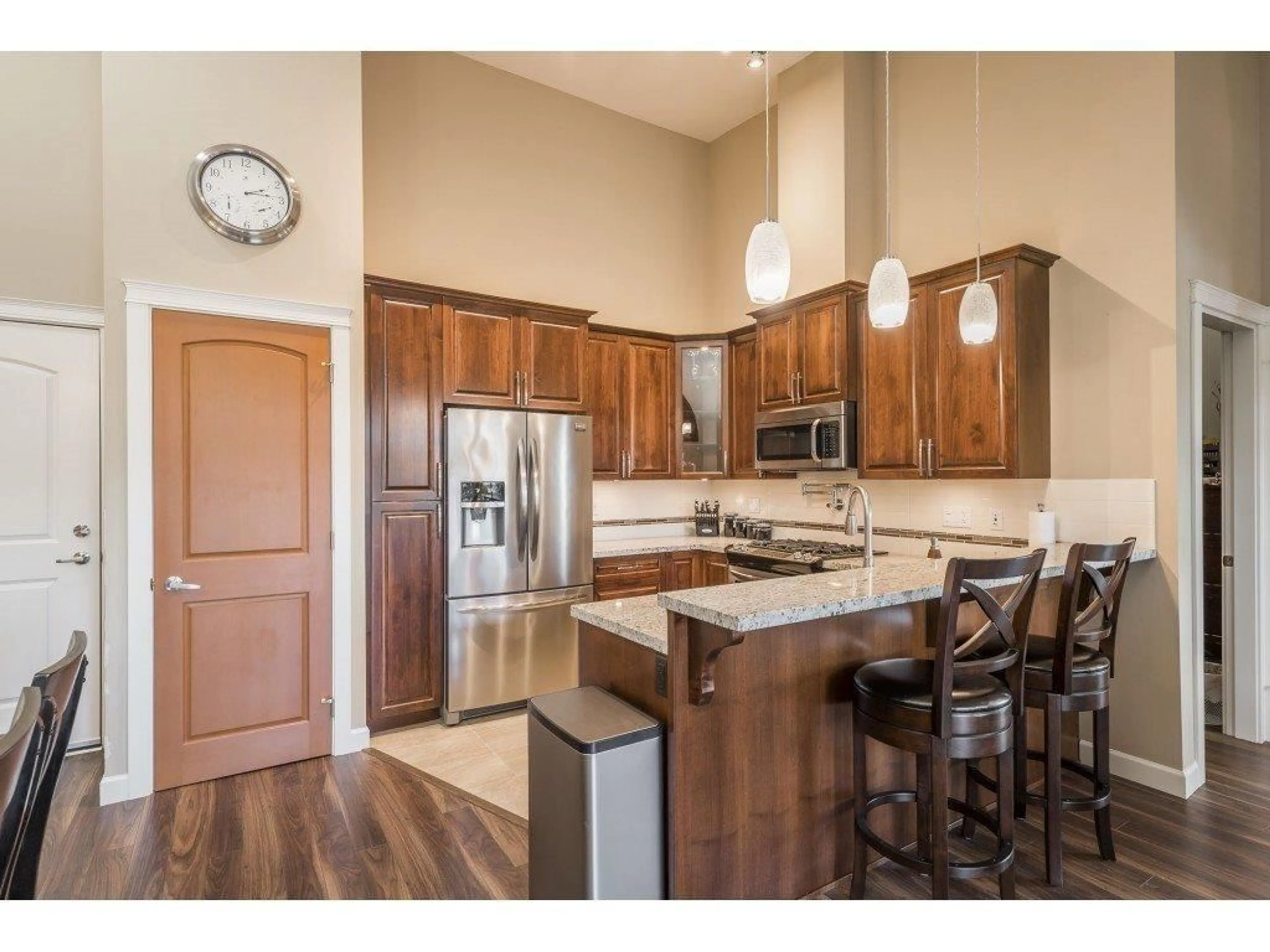 Open concept kitchen, unknown for 606 - 2860 TRETHEWEY STREET, Abbotsford British Columbia V2T0G5