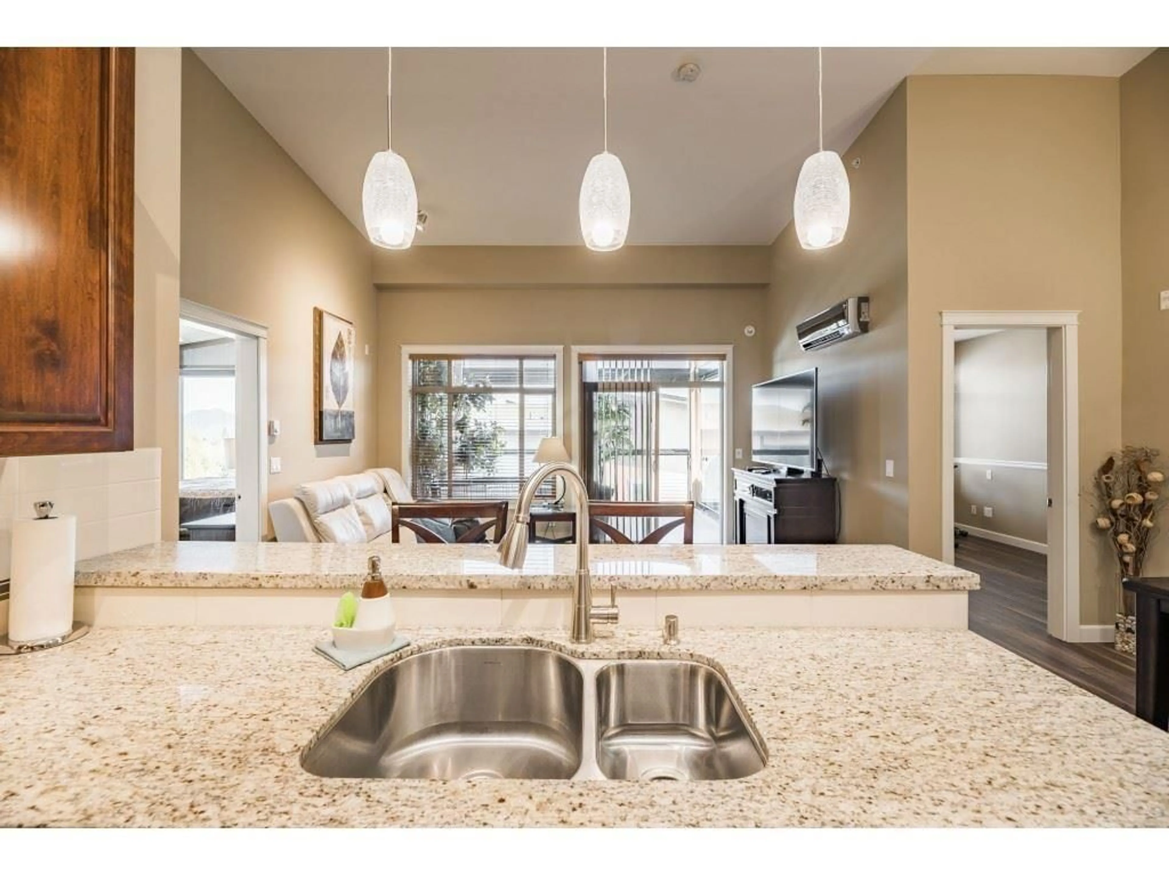 Open concept kitchen, ceramic/tile floor for 606 - 2860 TRETHEWEY STREET, Abbotsford British Columbia V2T0G5