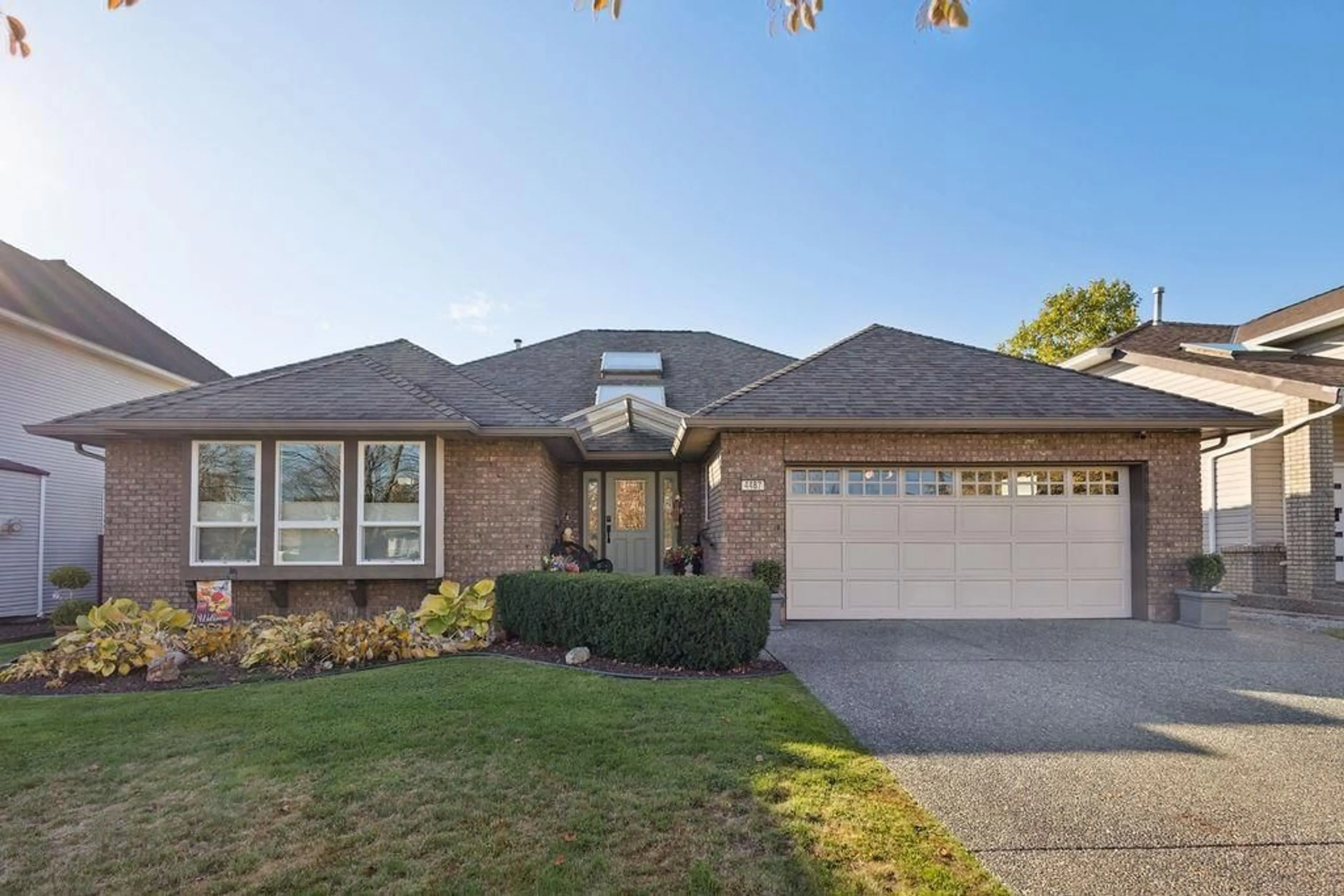 Home with brick exterior material, street for 4487 222A STREET, Langley British Columbia V2Z1B2