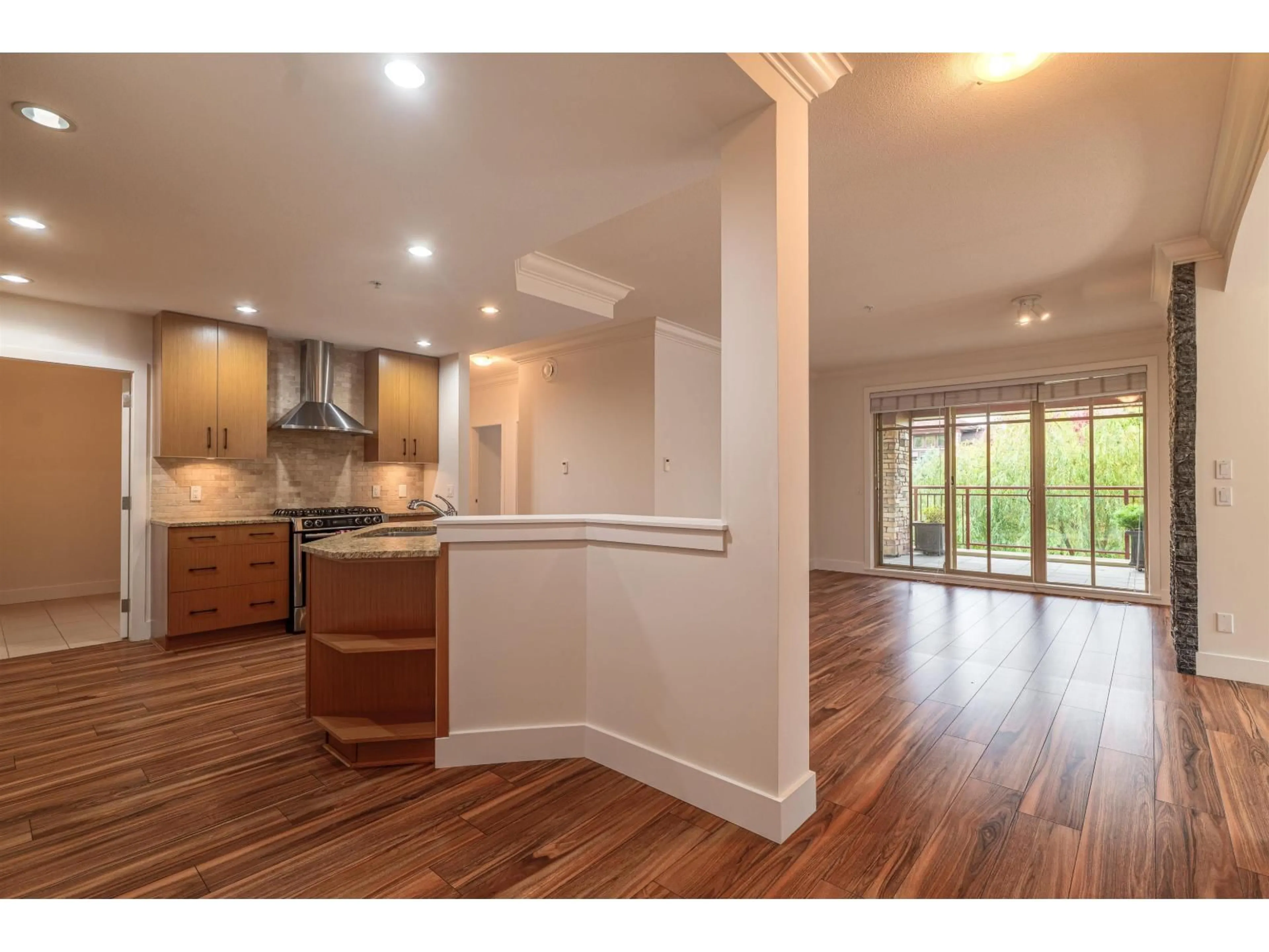 Open concept kitchen, wood/laminate floor for 207 - 16469 64 AVENUE, Surrey British Columbia V3S6V7