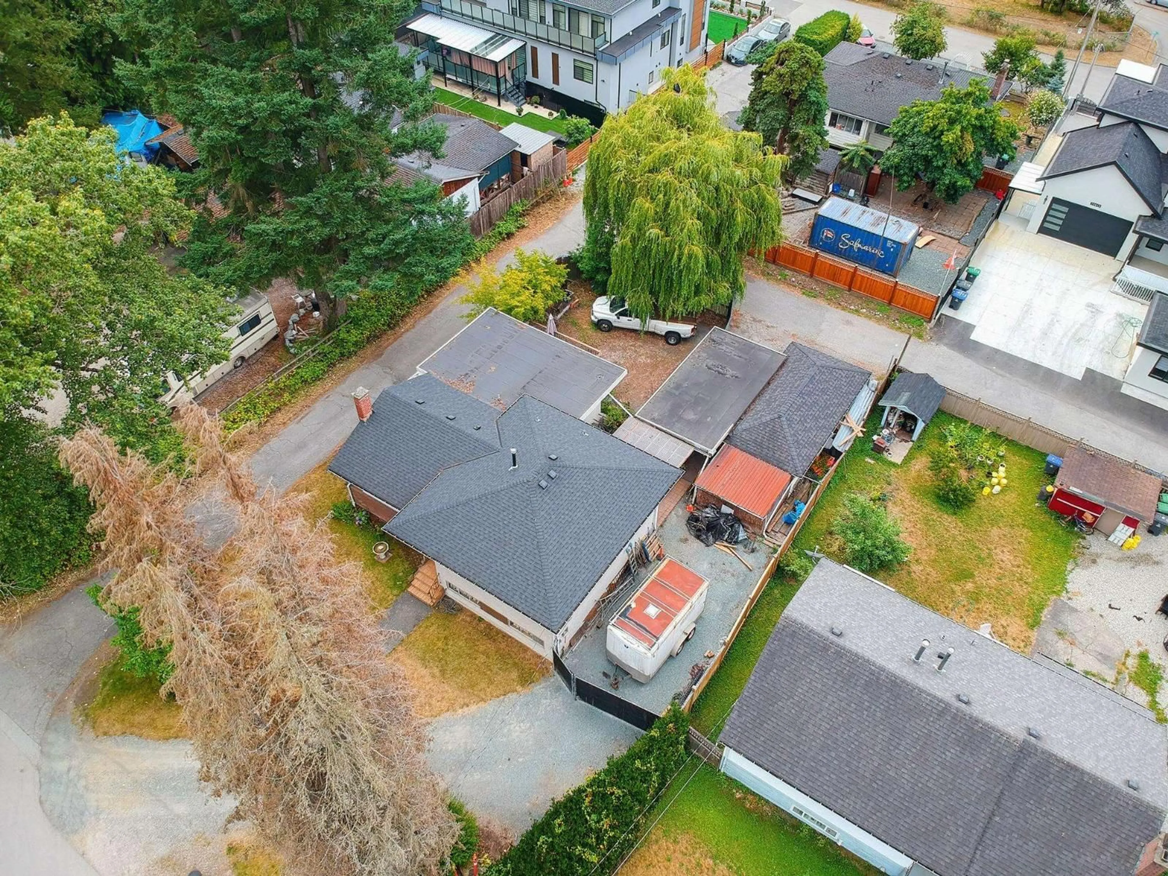 A pic from outside/outdoor area/front of a property/back of a property/a pic from drone, street for 13022 101 AVENUE, Surrey British Columbia V3T1L1