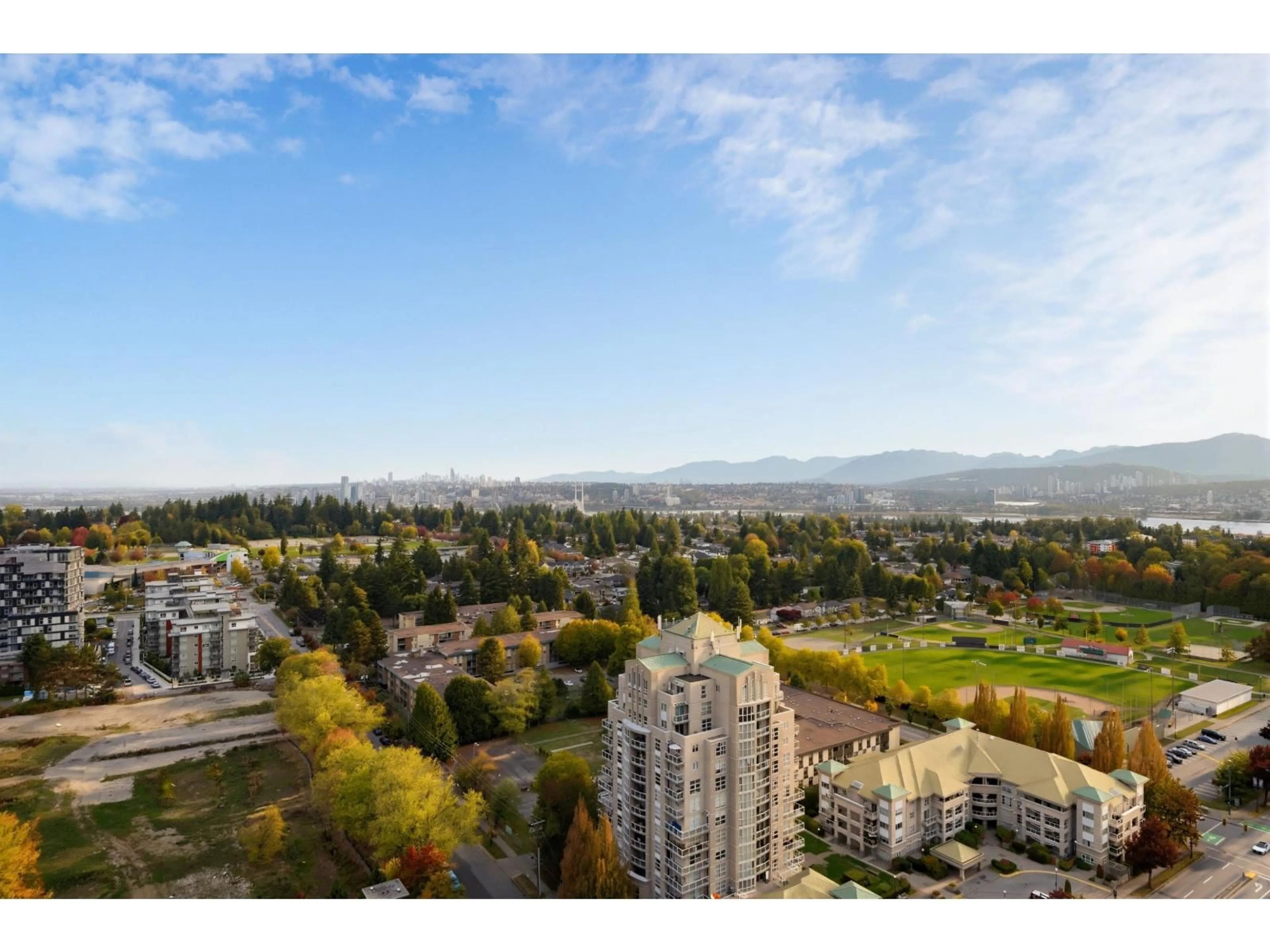 A pic from outside/outdoor area/front of a property/back of a property/a pic from drone, mountain view for 2611 - 13428 105 AVENUE, Surrey British Columbia V3T0S6