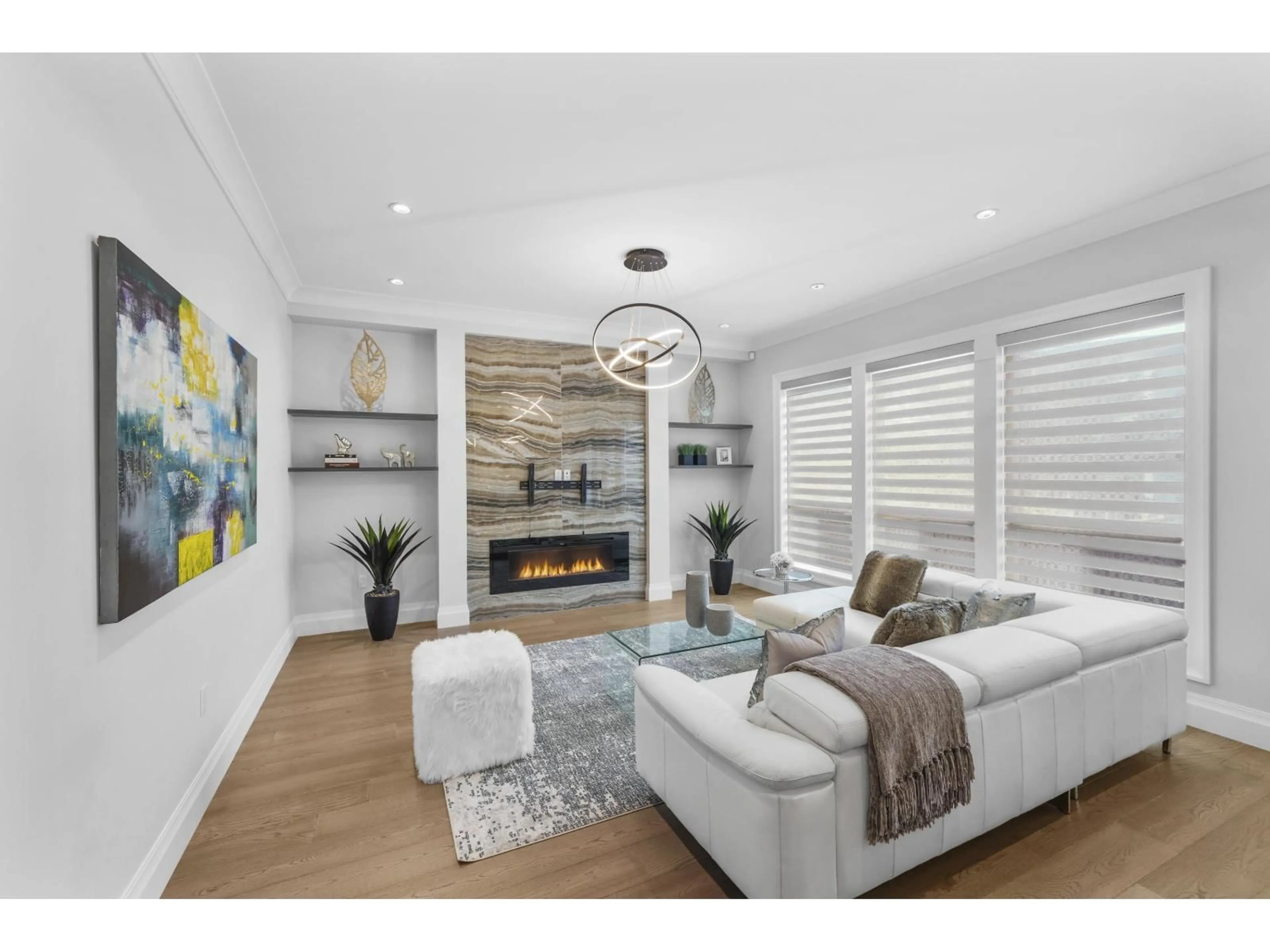 Living room with furniture, wood/laminate floor for 16692 18 AVENUE, Surrey British Columbia V3Z9X5