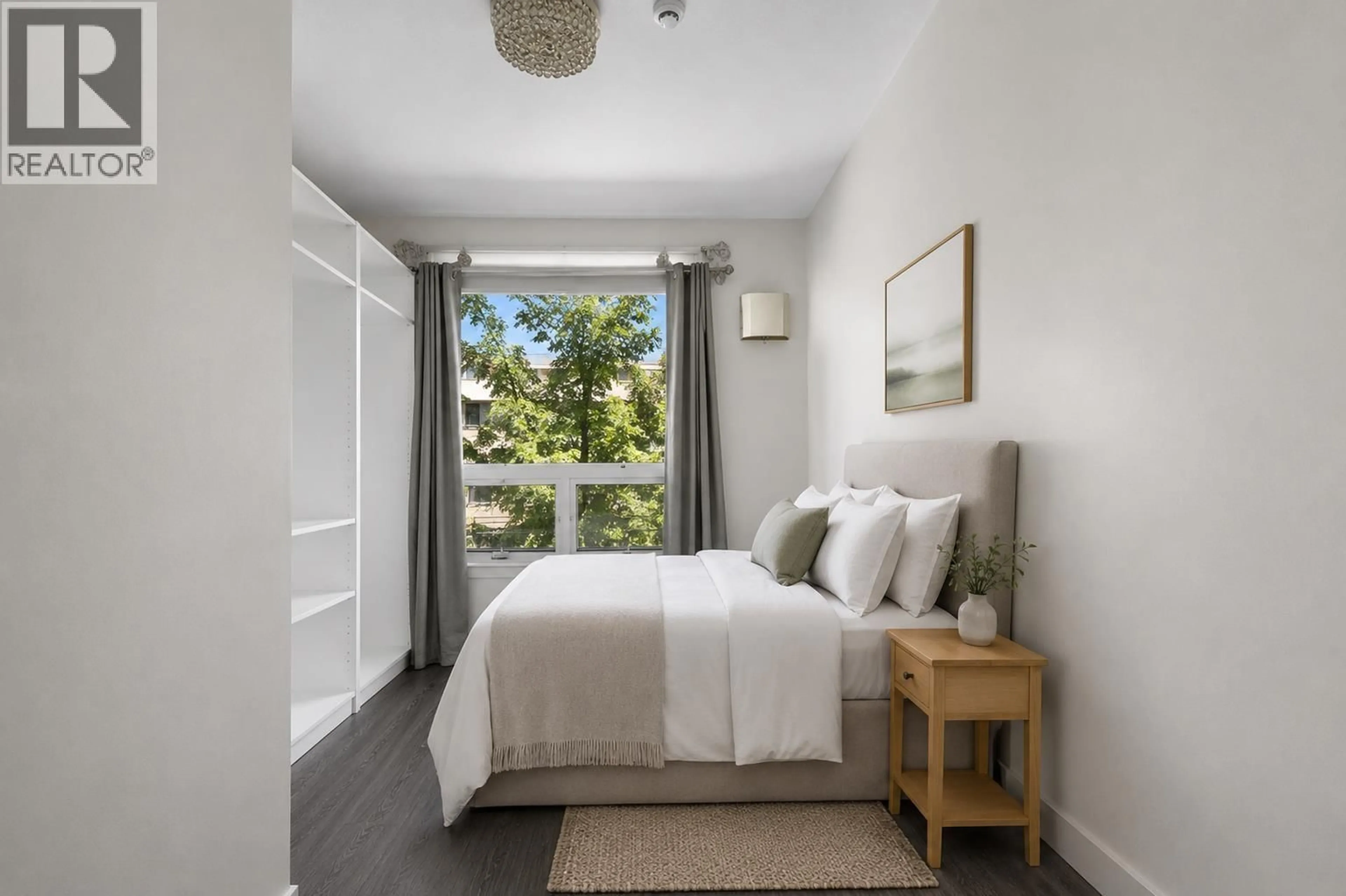 Bedroom with bed, unknown for 312 - 3138 RIVERWALK AVENUE, Vancouver British Columbia V5S0B6