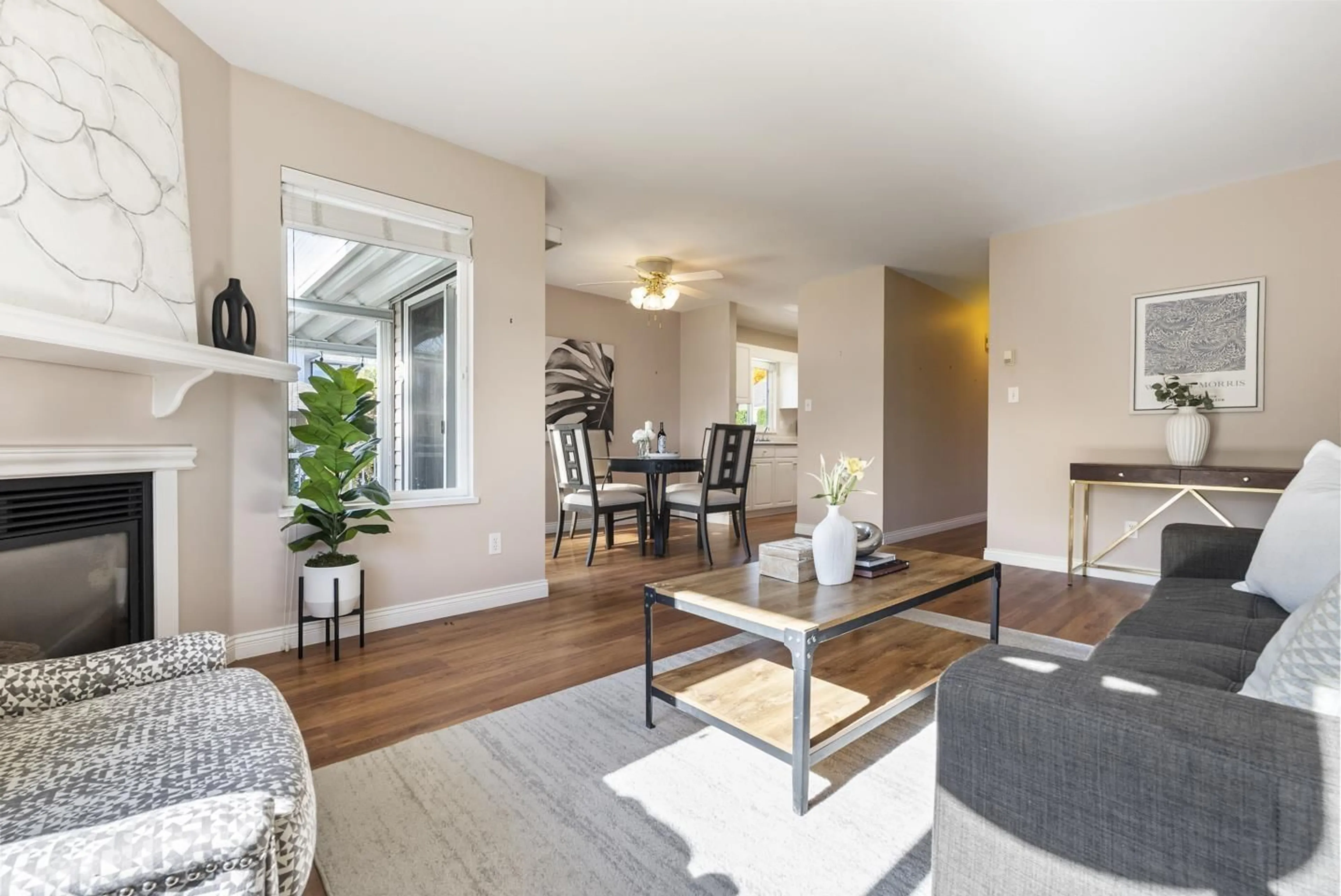 Living room with furniture, wood/laminate floor for 84 - 15020 66A AVENUE, Surrey British Columbia V3S2A5