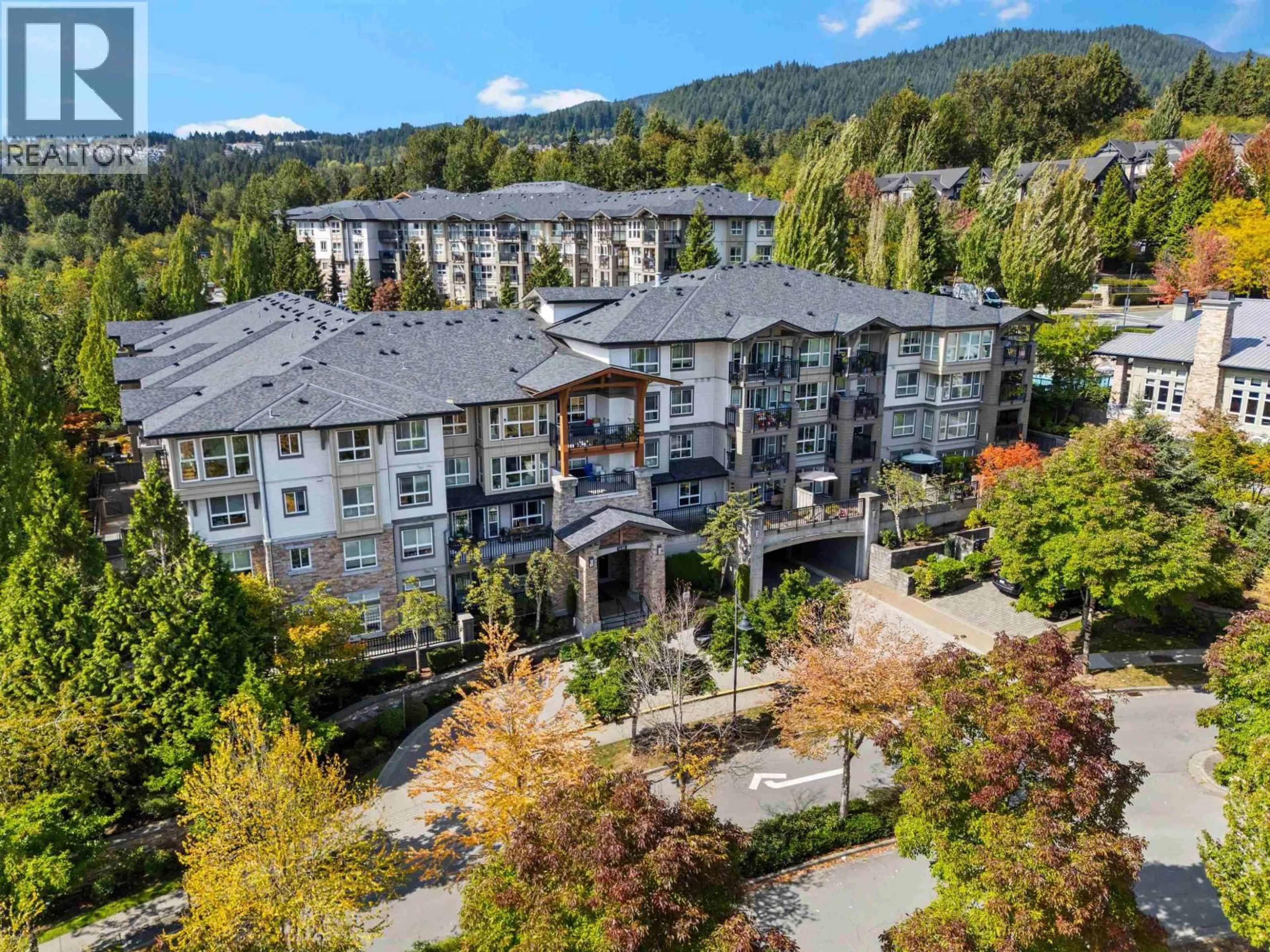 A pic from outside/outdoor area/front of a property/back of a property/a pic from drone, mountain view for 211 - 1330 GENEST WAY, Coquitlam British Columbia V3E0A4