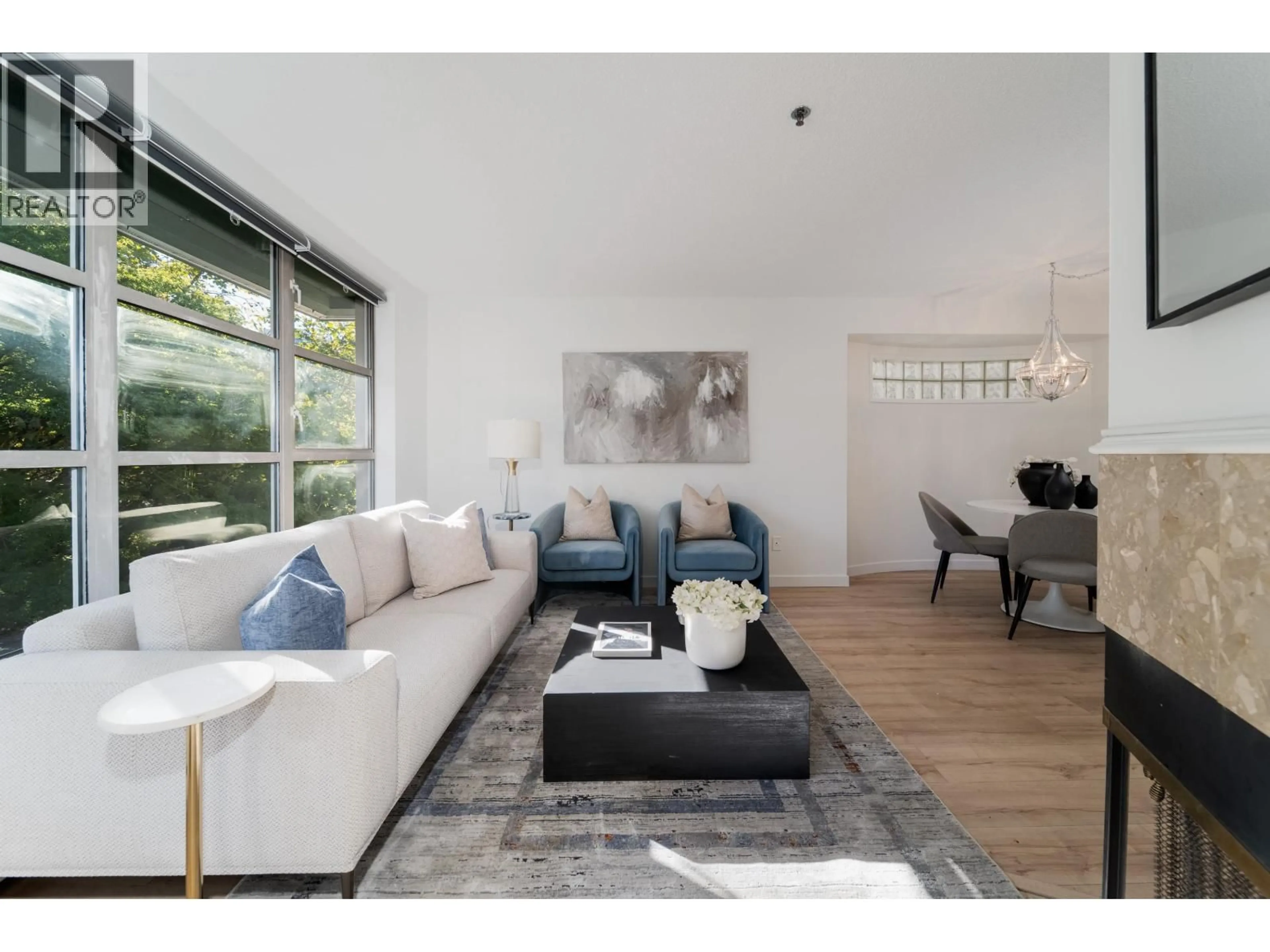Living room with furniture, wood/laminate floor for 307 - 1705 NELSON STREET, Vancouver British Columbia V6G1M6