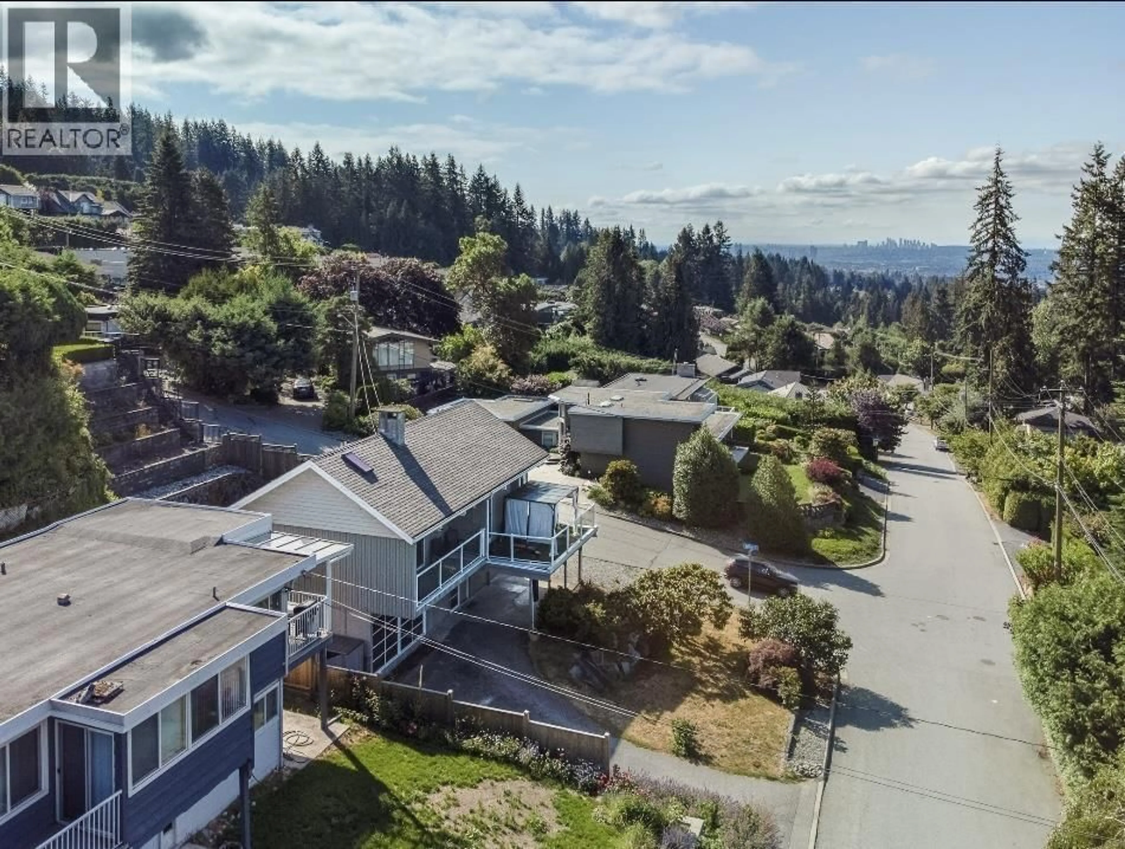 A pic from outside/outdoor area/front of a property/back of a property/a pic from drone, mountain view for 442 MONTERAY AVENUE, North Vancouver British Columbia V7N3G2