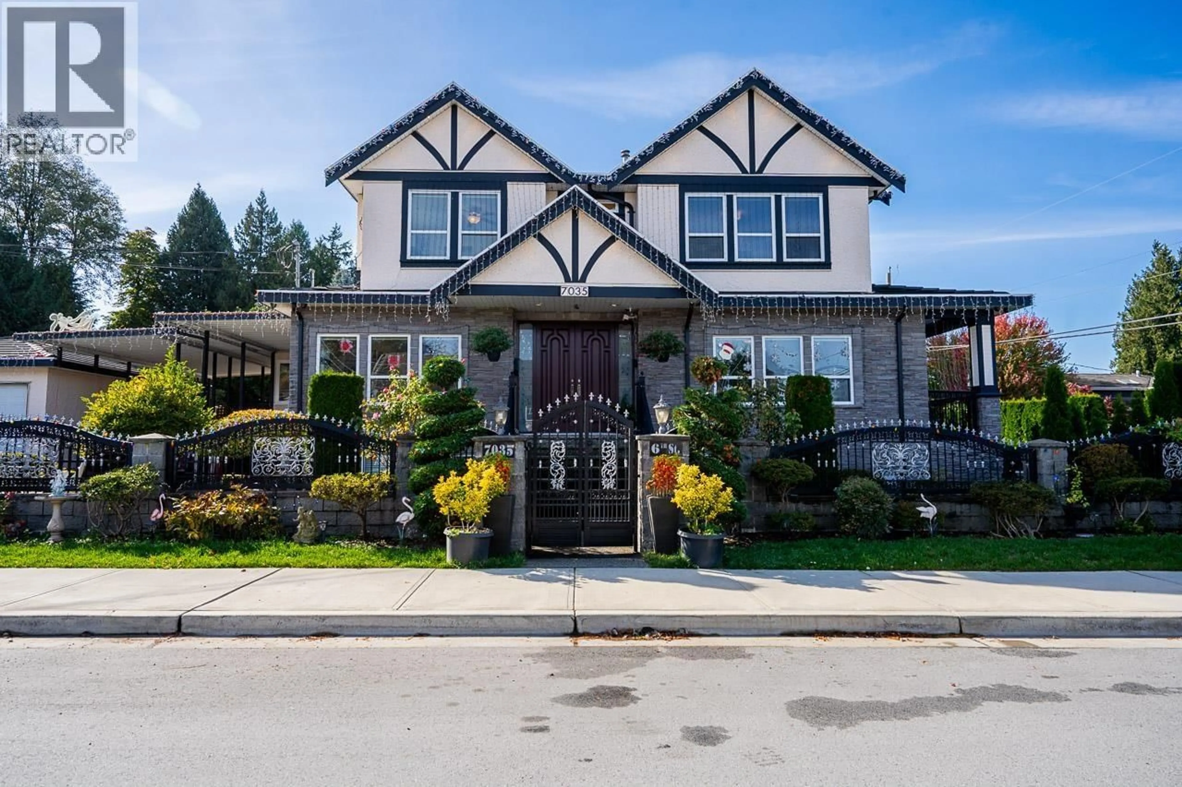 Home with vinyl exterior material, street for 7035 6TH STREET, Burnaby British Columbia V5E3T4
