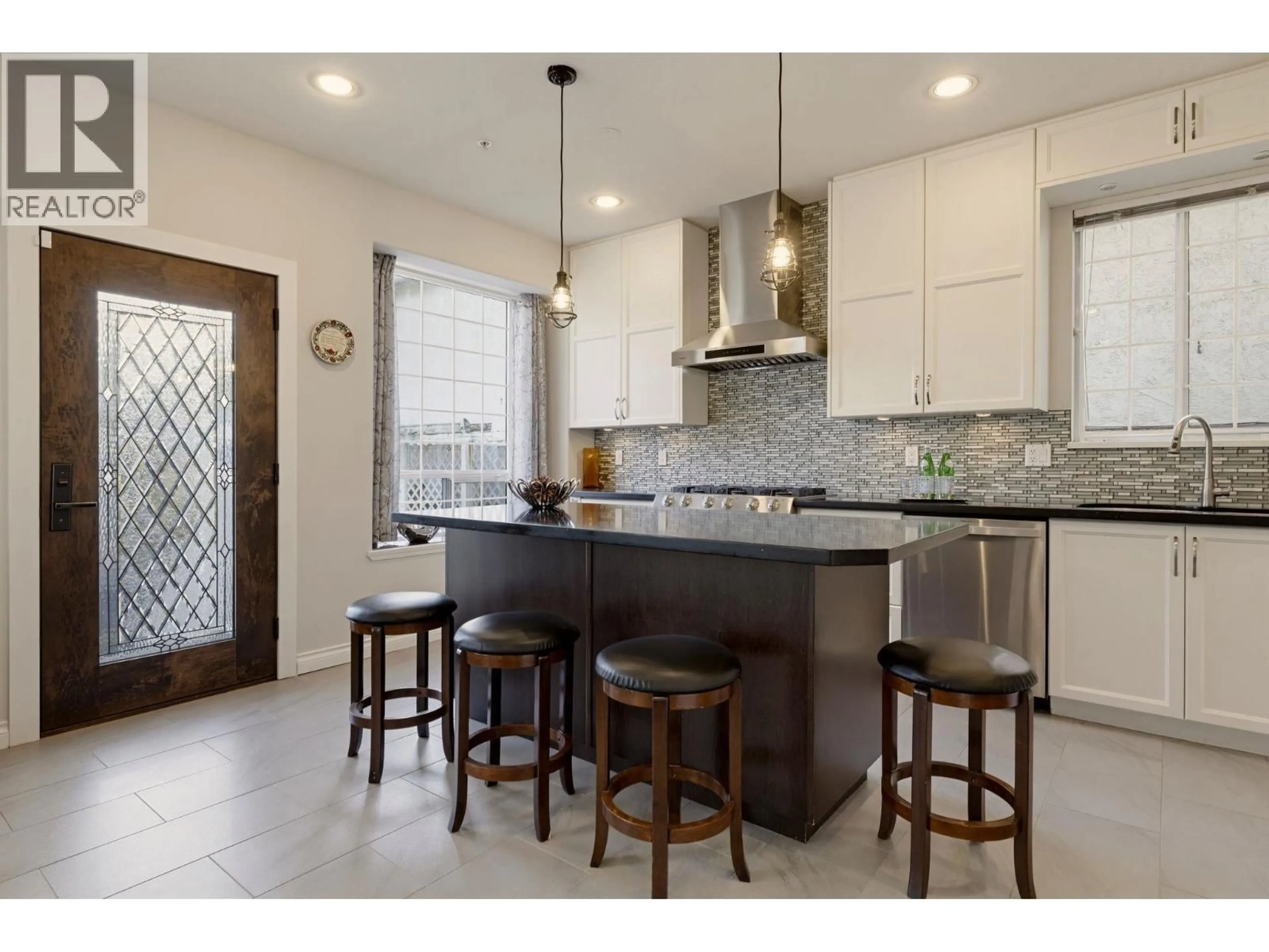 Open concept kitchen, ceramic/tile floor for 5454 INVERNESS STREET, Vancouver British Columbia V5W3P1