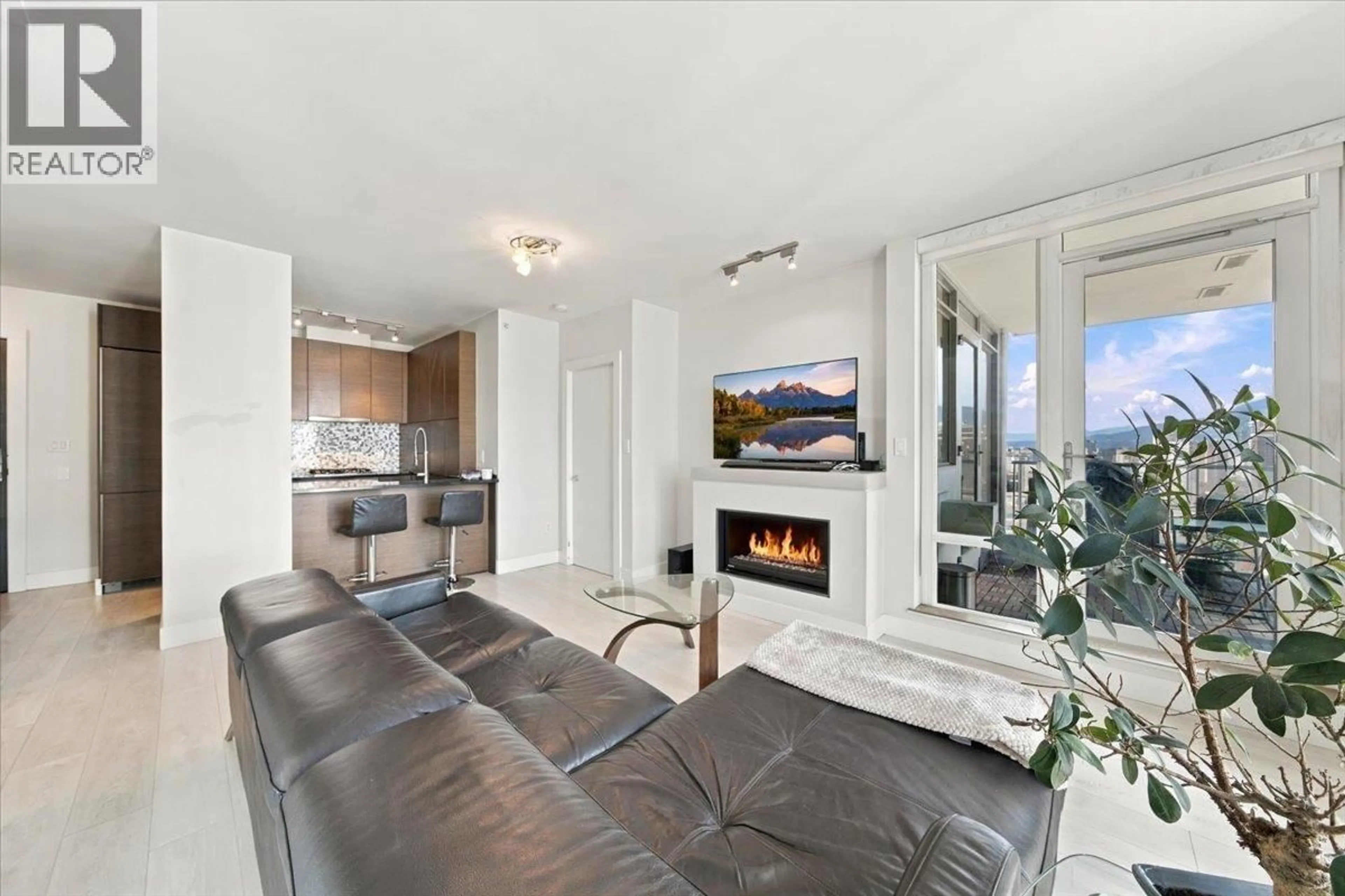 Living room with furniture, ceramic/tile floor for 2404 - 565 SMITHE STREET, Vancouver British Columbia V6B0E4