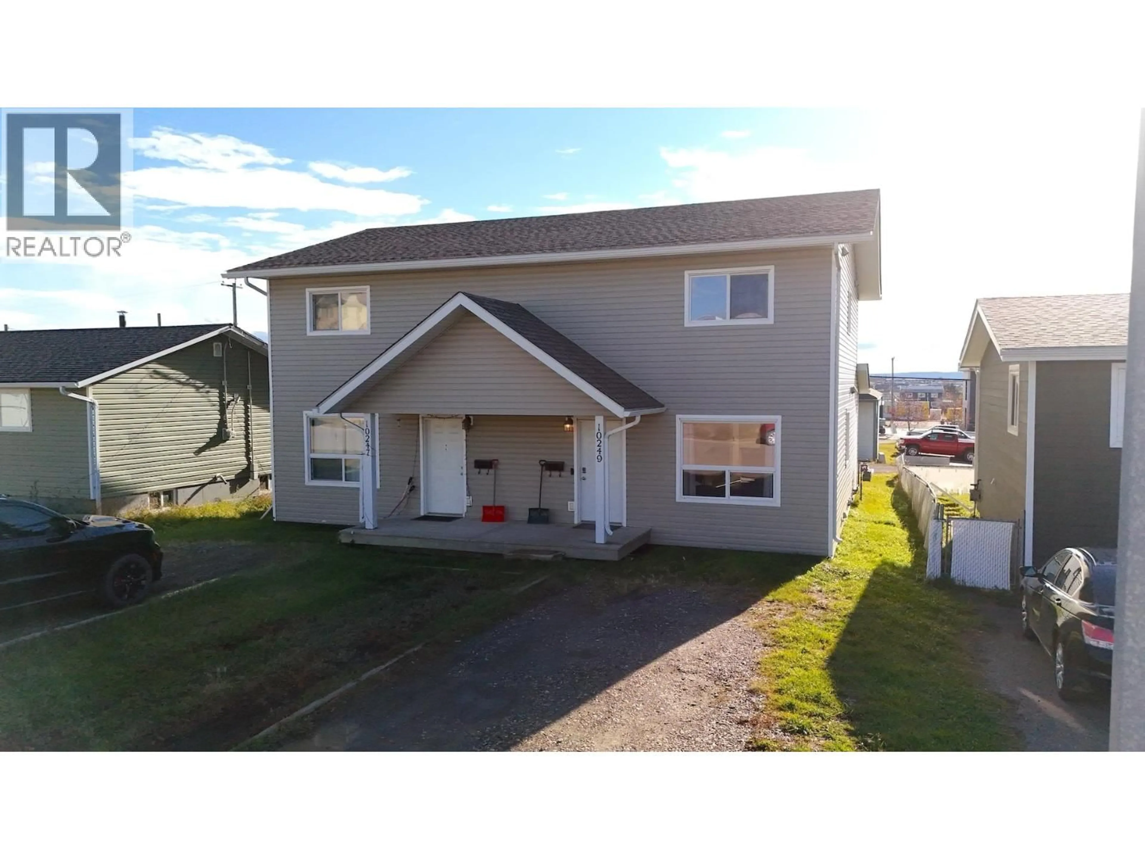 A pic from outside/outdoor area/front of a property/back of a property/a pic from drone, street for 10249 102 AVENUE, Fort St. John British Columbia V1J2E4