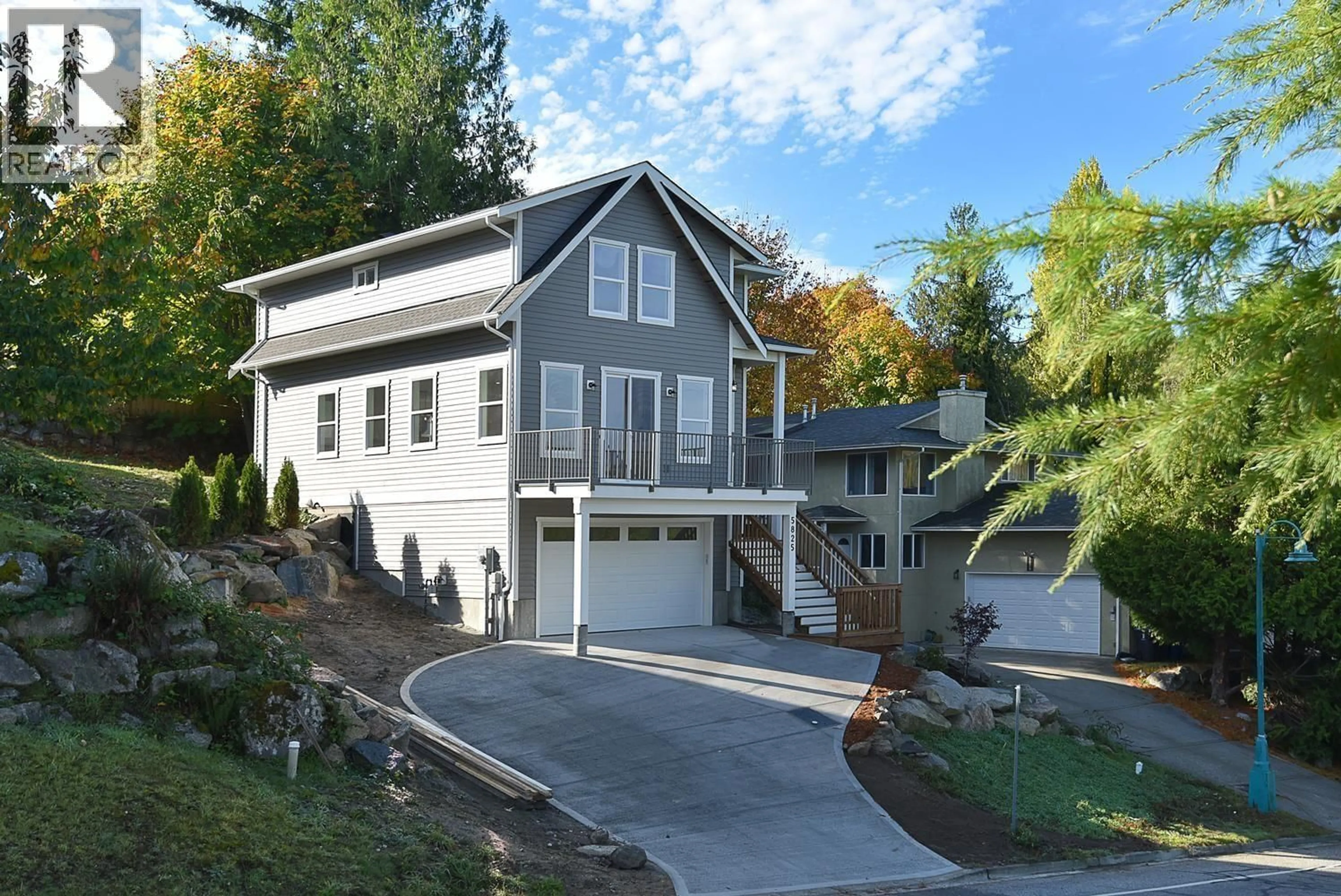 Home with vinyl exterior material, street for 5825 TRAIL AVENUE, Sechelt British Columbia V7Z0K5