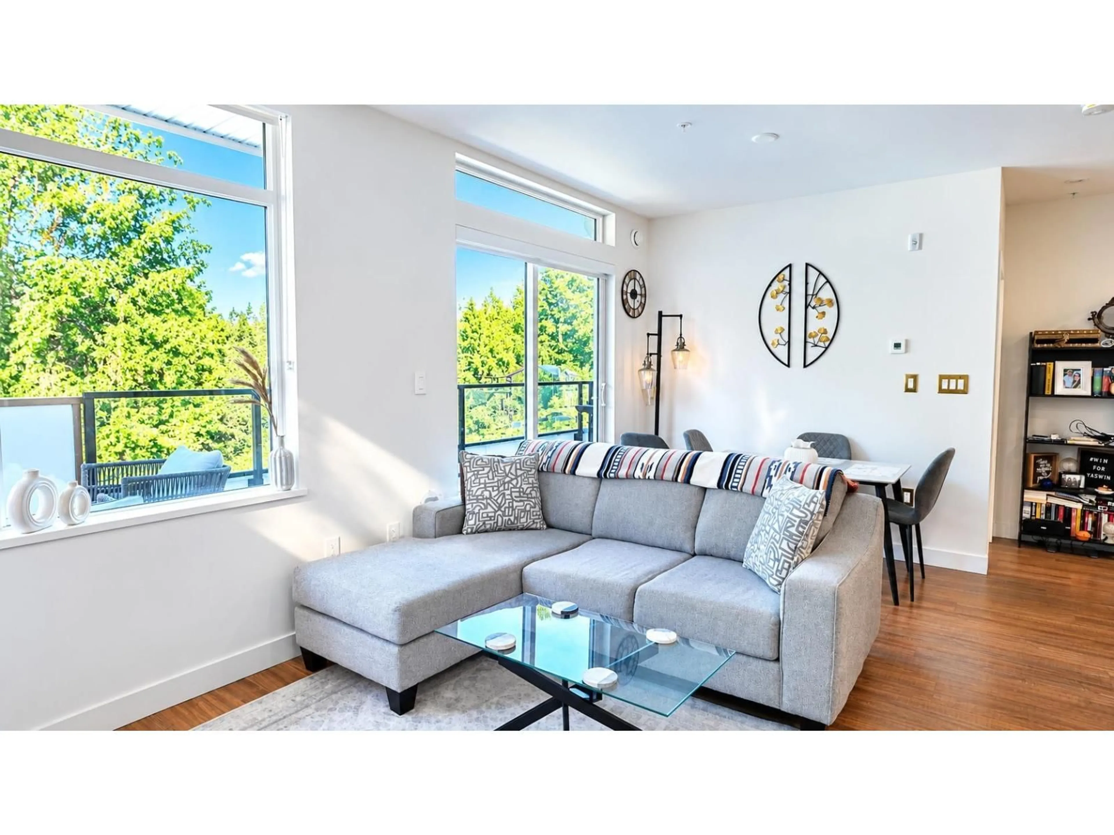 Living room with furniture, wood/laminate floor for 413 - 31900 RAVEN AVENUE, Mission British Columbia V2V0H5