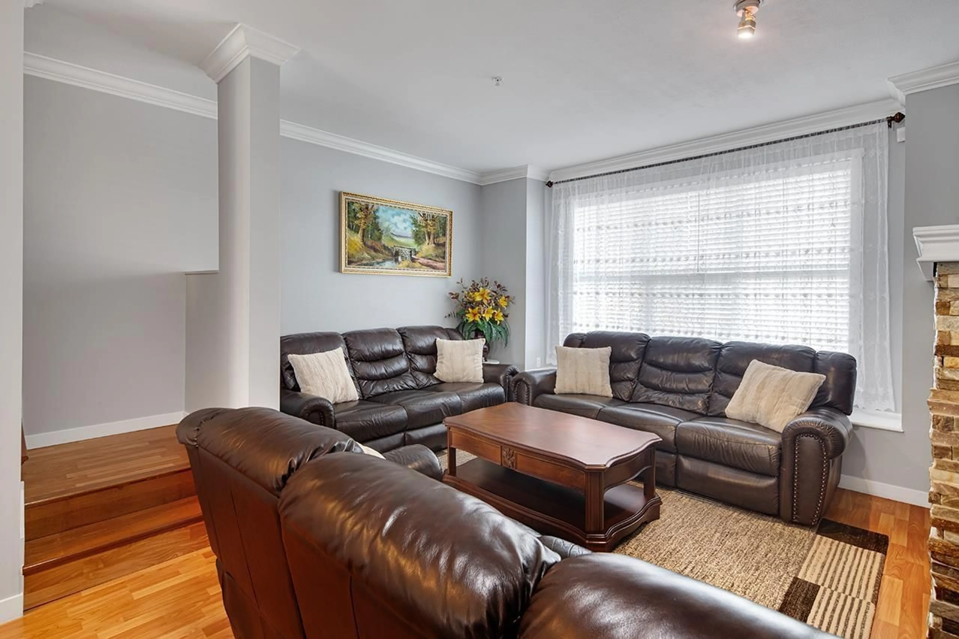 Living room with furniture, wood/laminate floor for 87 - 20460 66 AVENUE, Langley British Columbia V2Y3B6