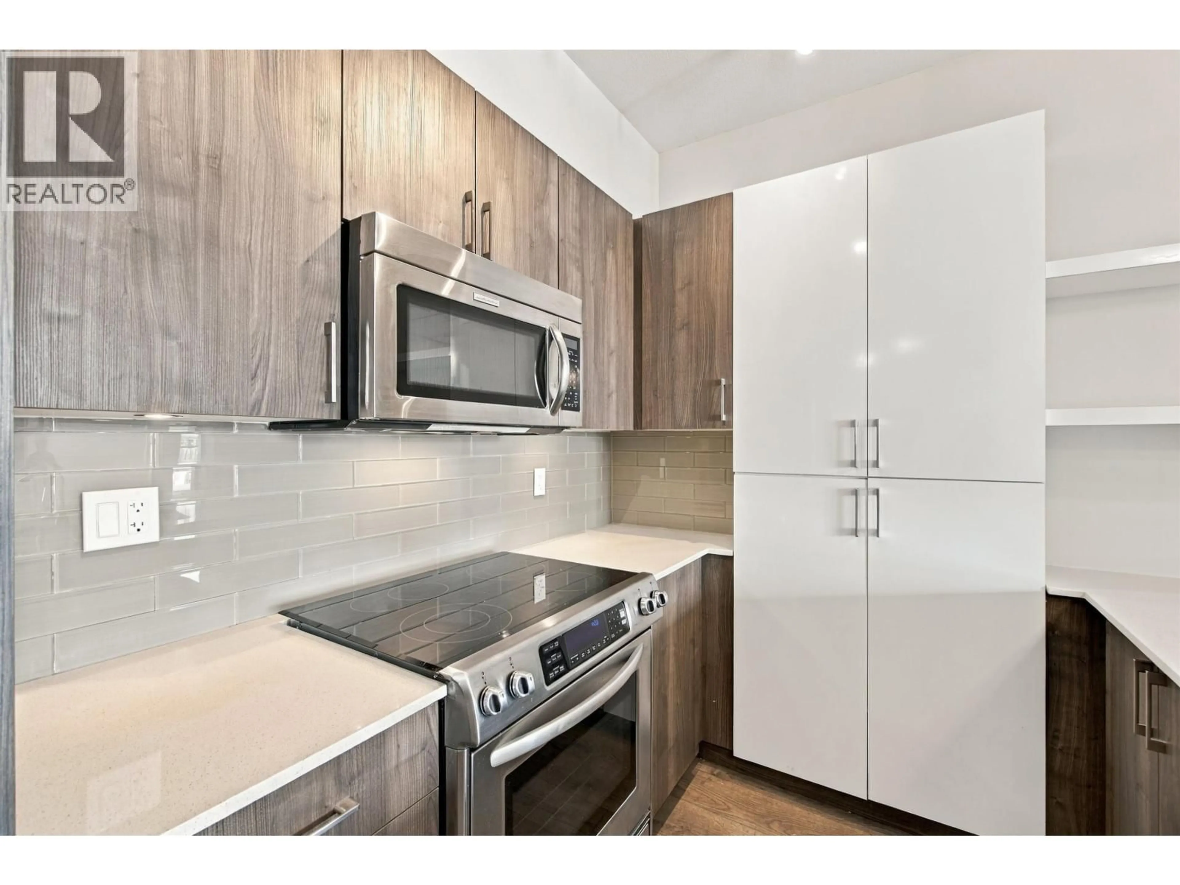 Standard kitchen, wood/laminate floor for 410 - 630 COMO LAKE AVENUE, Coquitlam British Columbia V3J0E4