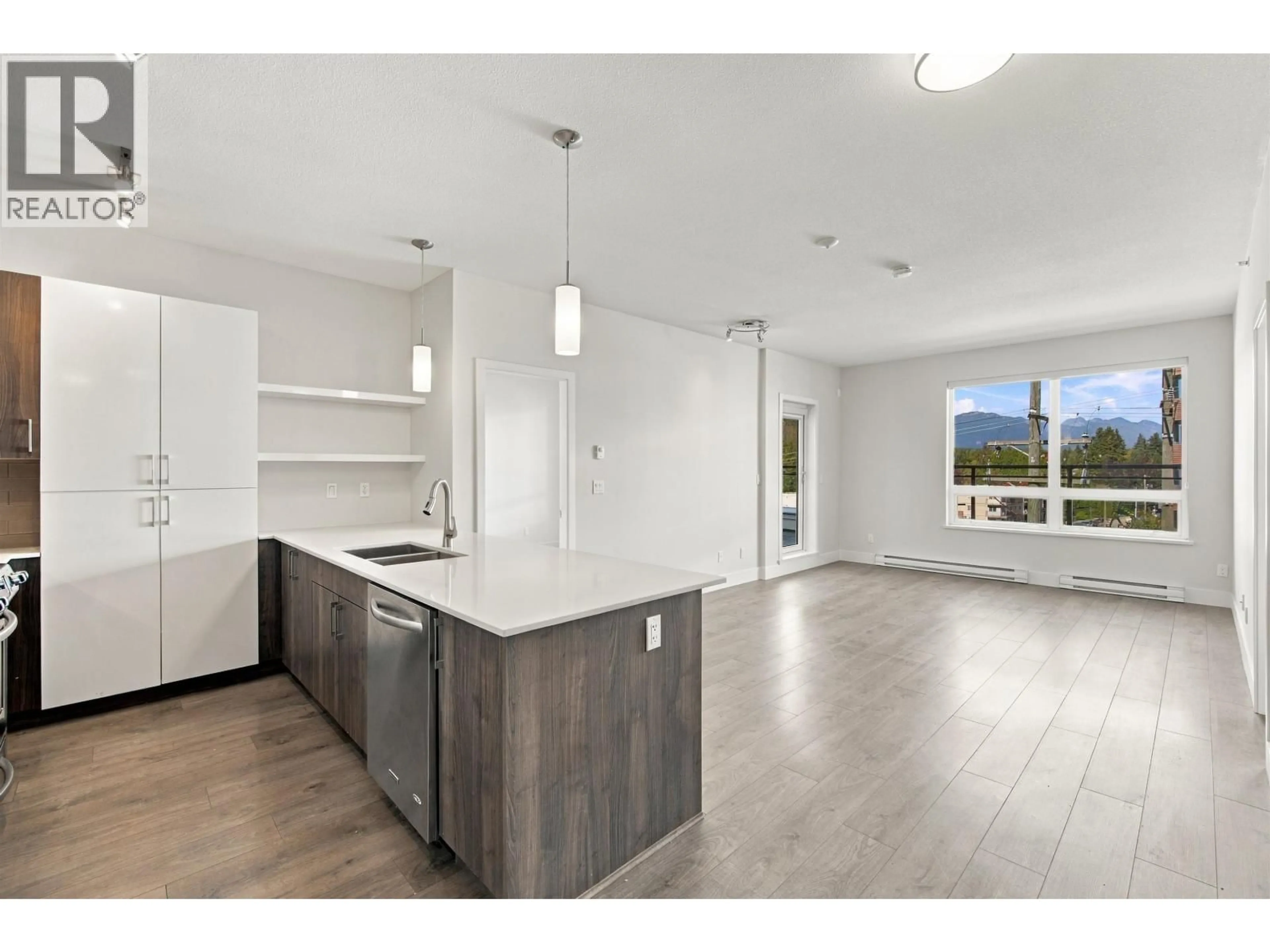 Open concept kitchen, unknown for 410 - 630 COMO LAKE AVENUE, Coquitlam British Columbia V3J0E4