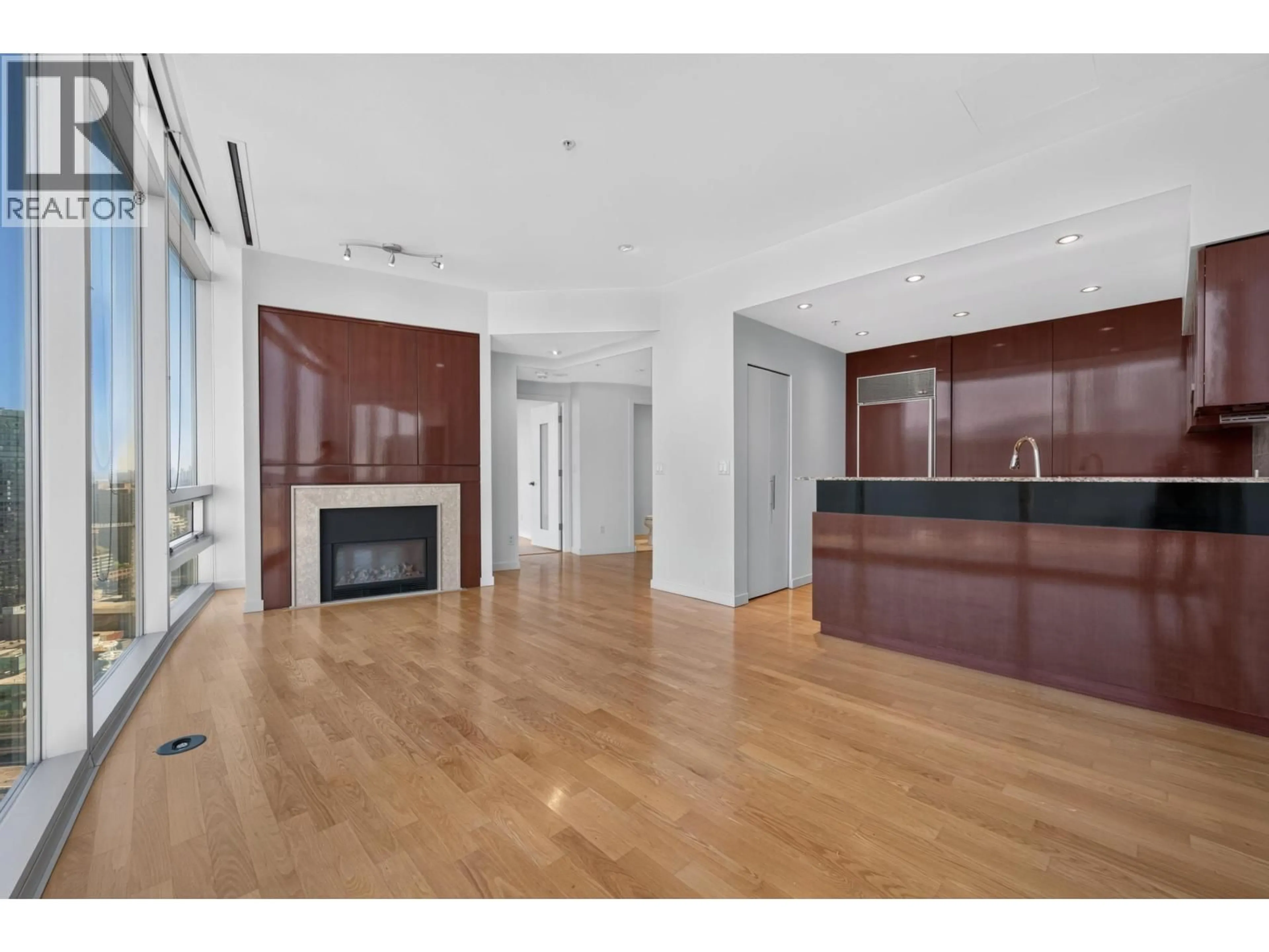 Open concept kitchen, wood/laminate floor for 3103 - 938 NELSON STREET, Vancouver British Columbia V6Z3A7