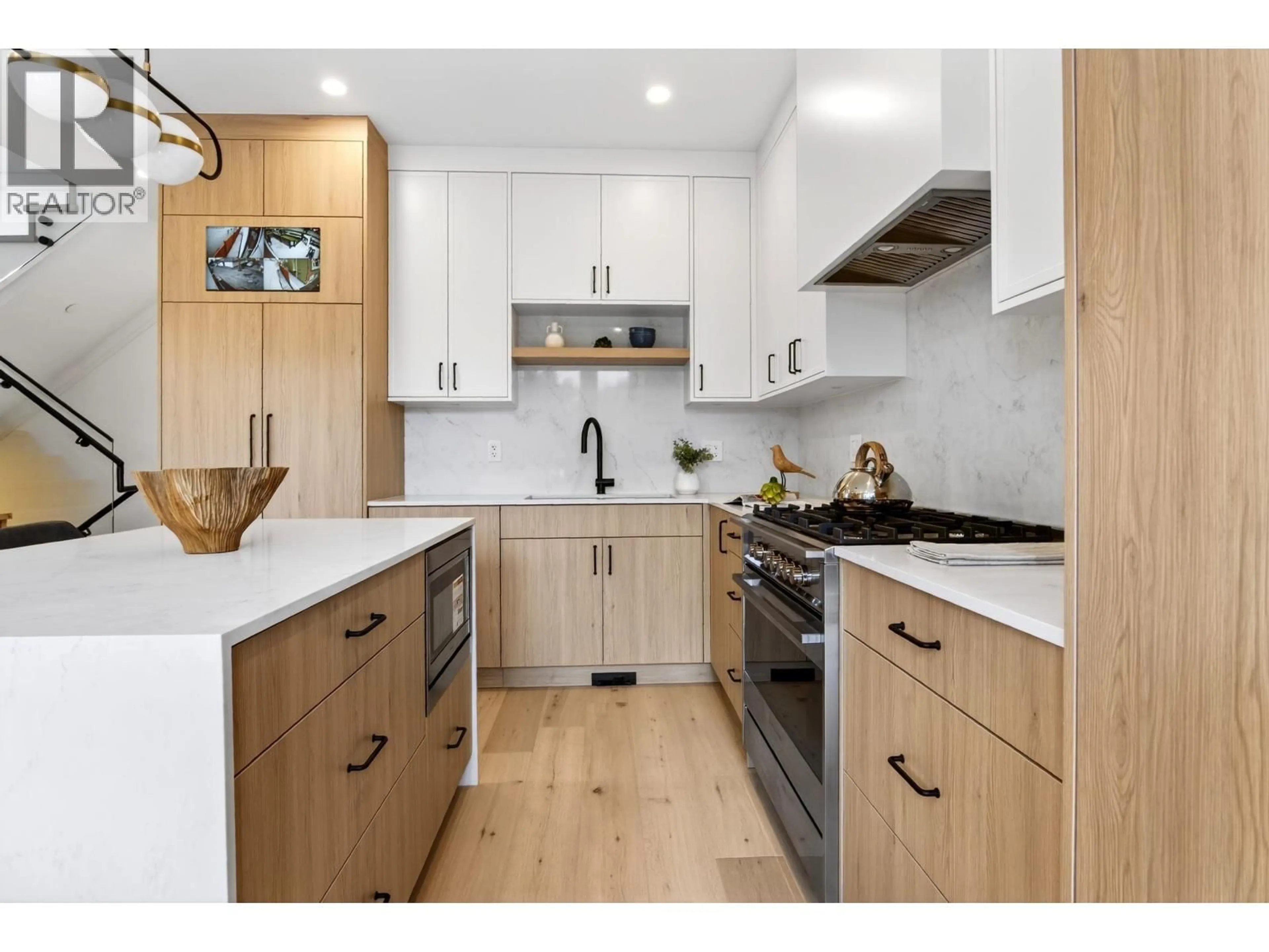 Contemporary kitchen, wood/laminate floor for 1 - 2741 7TH AVENUE, Vancouver British Columbia V5M1T8