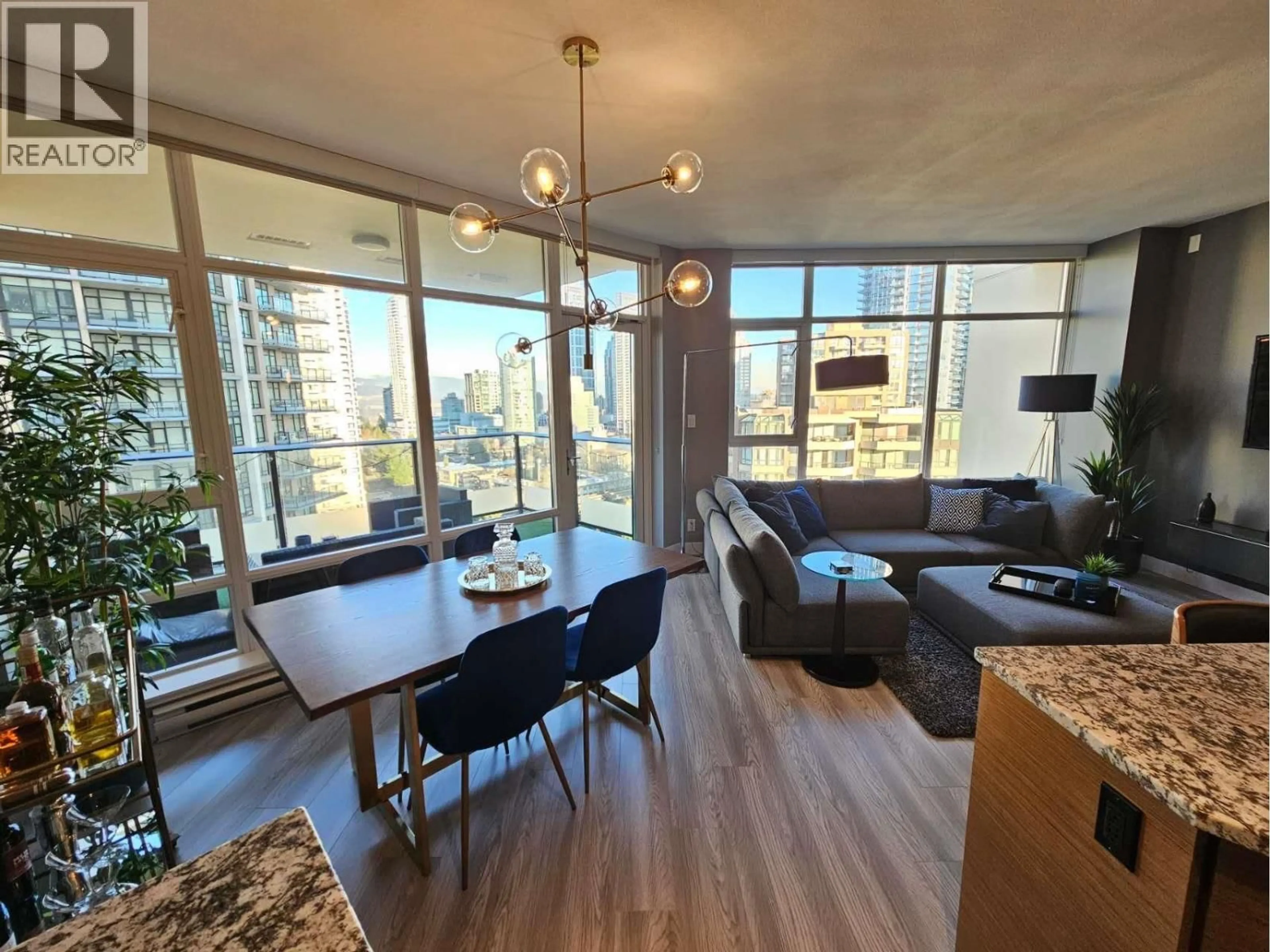 Living room with furniture, wood/laminate floor for 1405 - 6188 WILSON AVENUE, Burnaby British Columbia V5H0A5