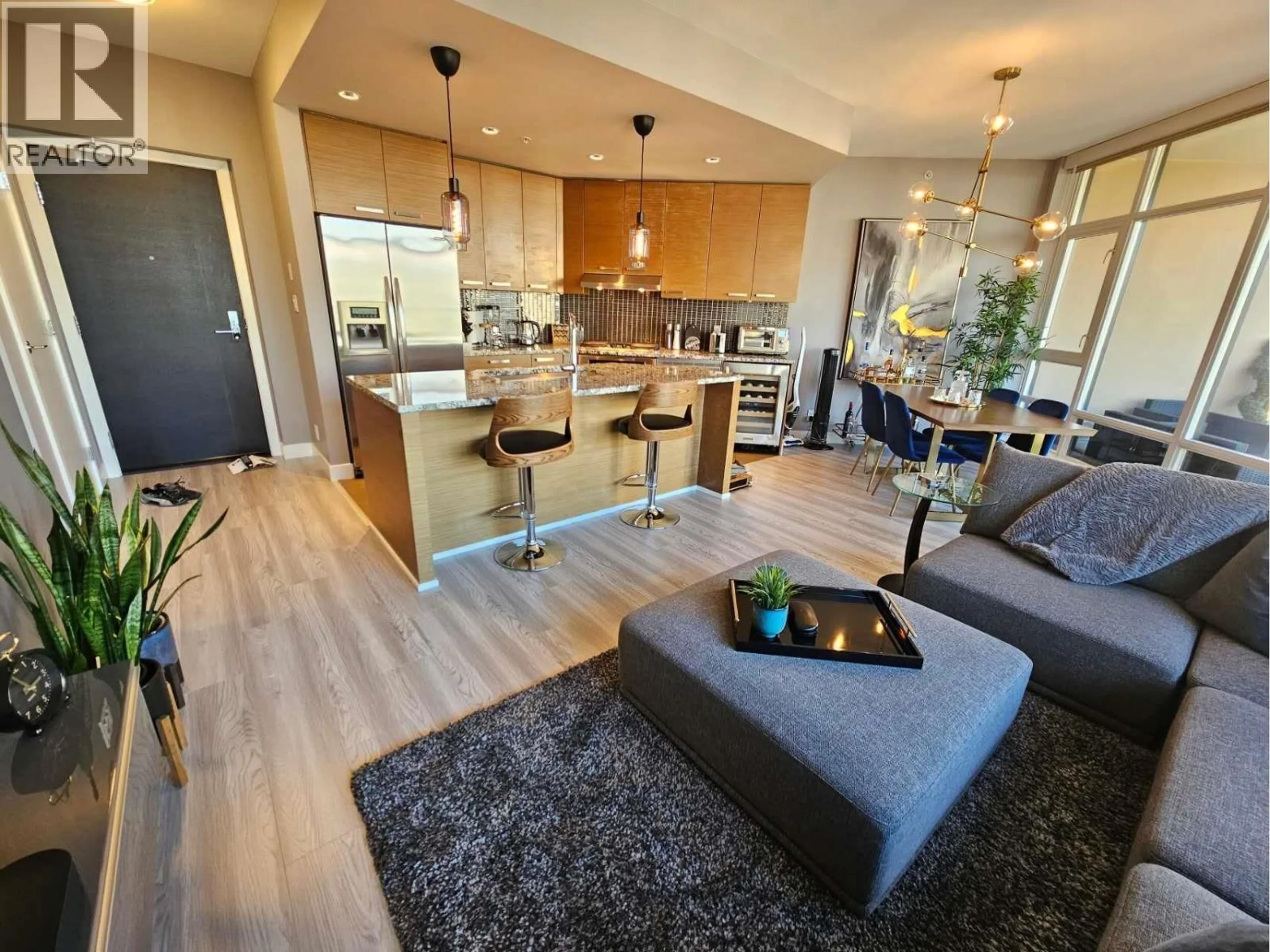 Open concept kitchen, wood/laminate floor for 1405 - 6188 WILSON AVENUE, Burnaby British Columbia V5H0A5
