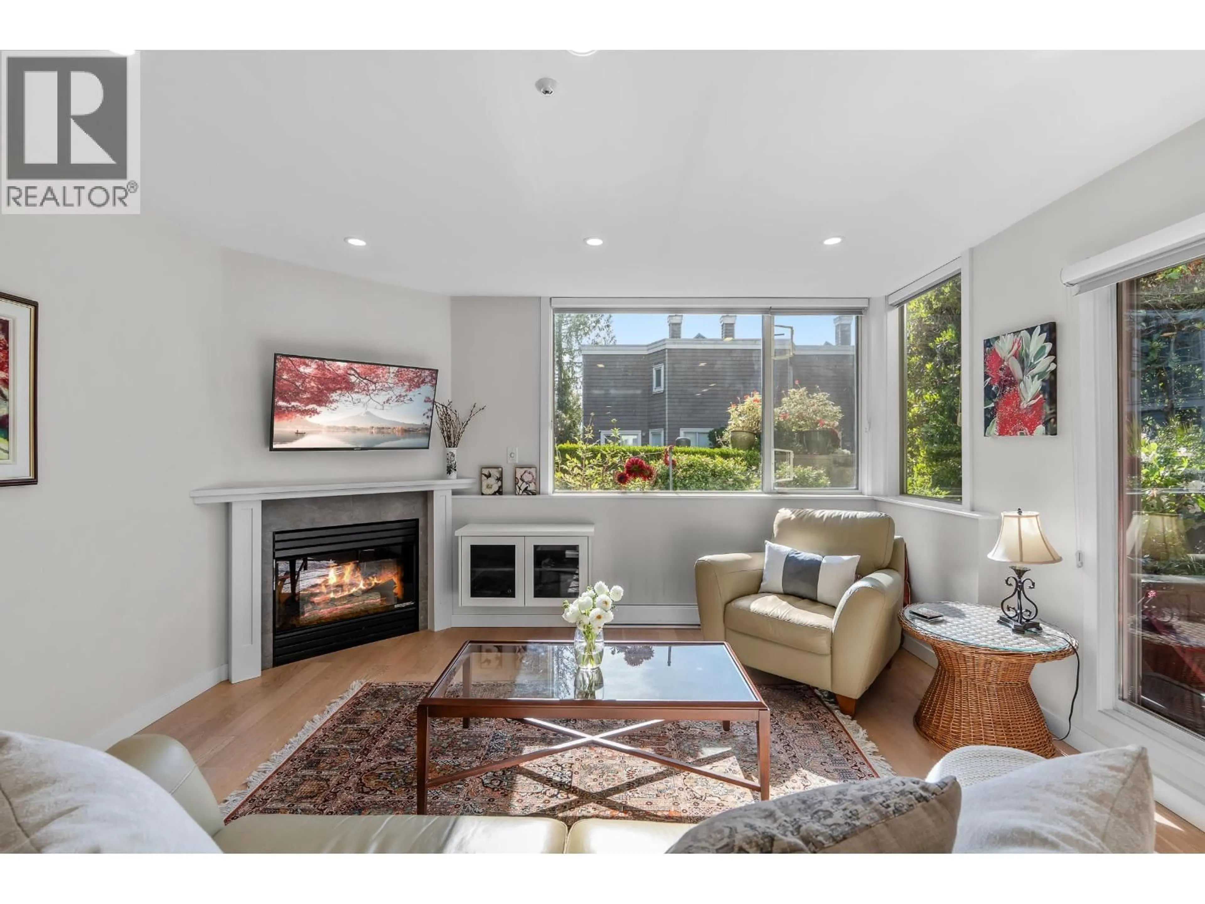 Living room with furniture, unknown for 112 - 8450 JELLICOE STREET, Vancouver British Columbia V5S4S9