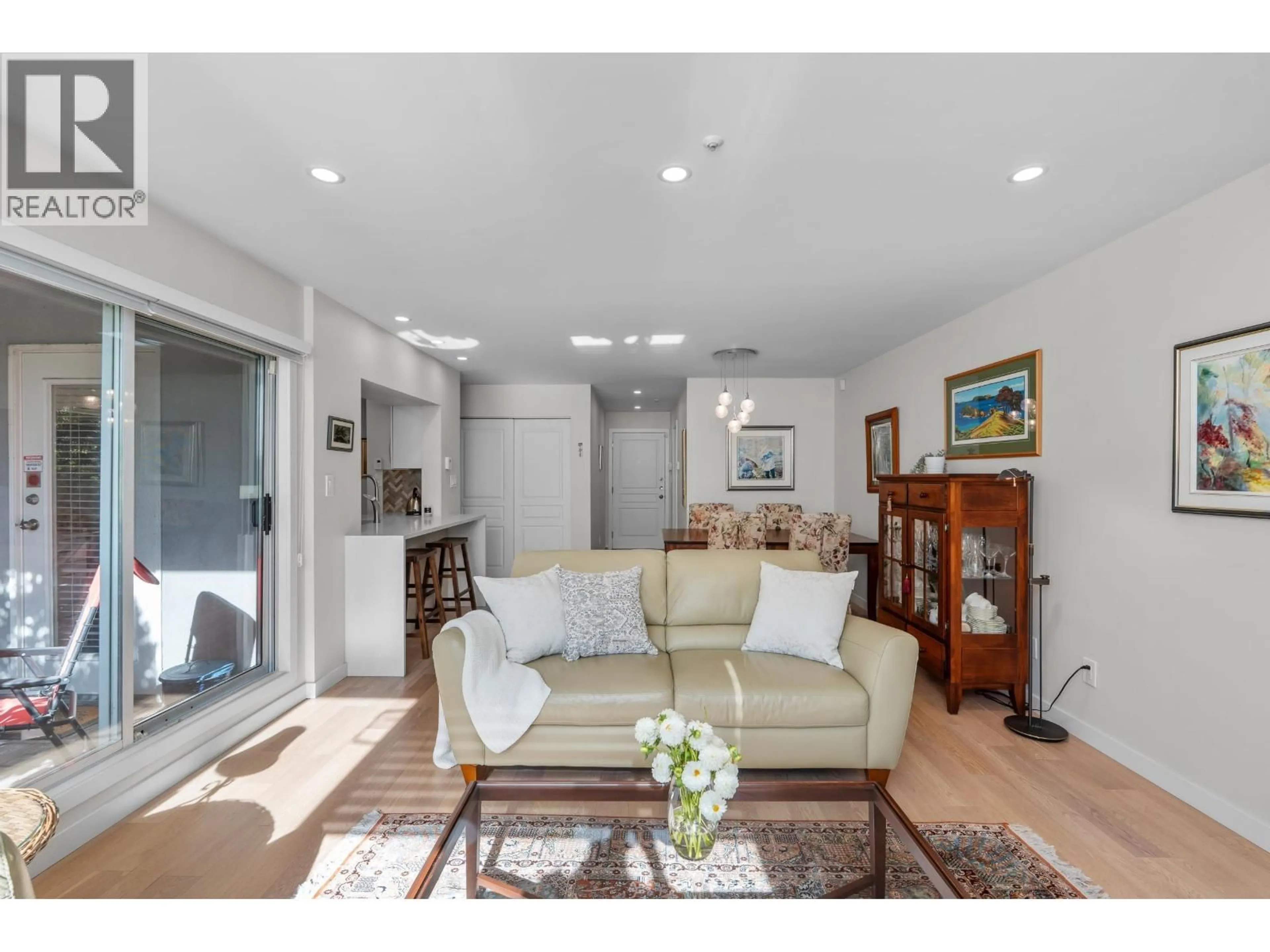 Living room with furniture, unknown for 112 - 8450 JELLICOE STREET, Vancouver British Columbia V5S4S9