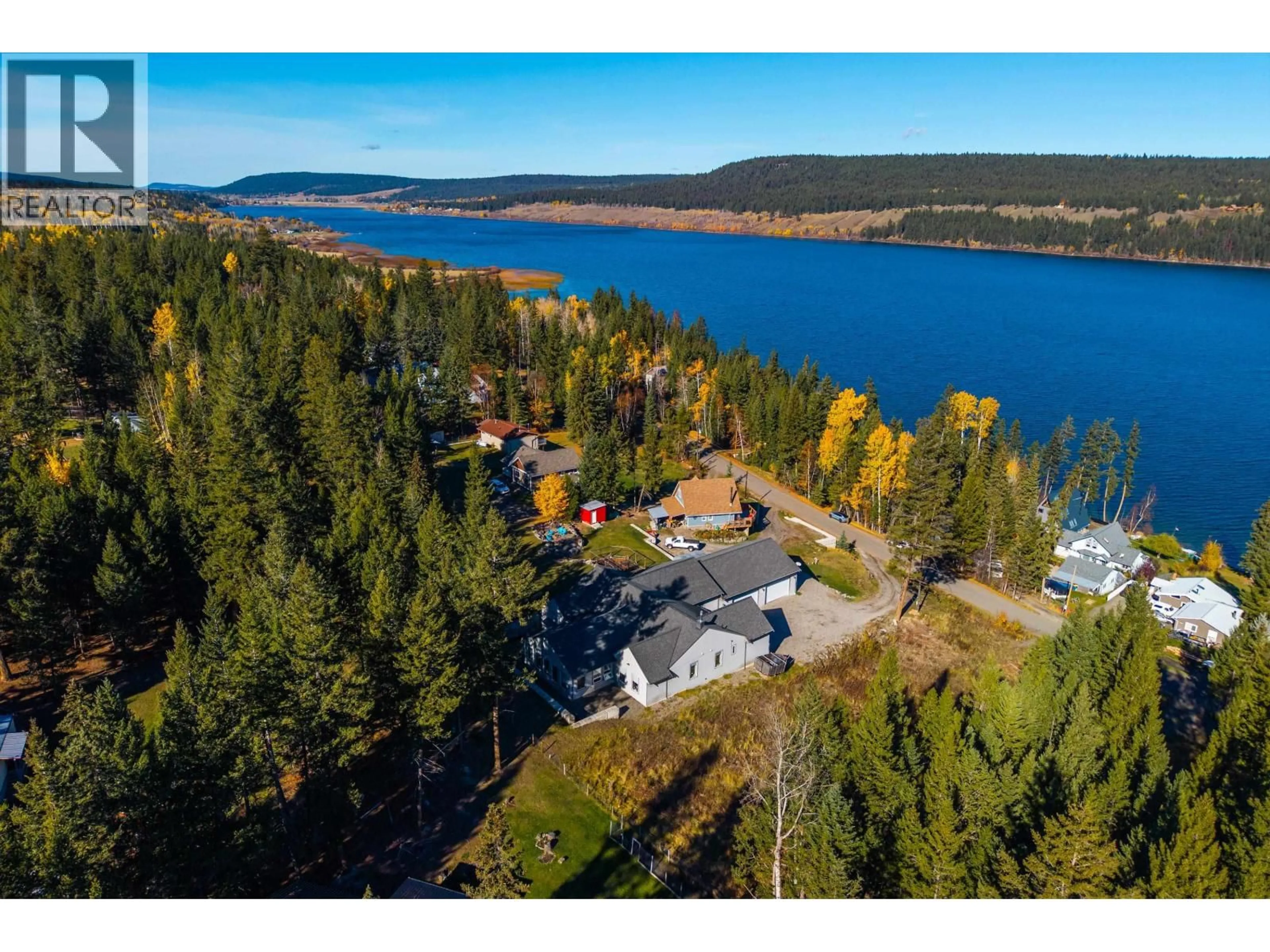 A pic from outside/outdoor area/front of a property/back of a property/a pic from drone, water/lake/river/ocean view for 6296 MULLIGAN DRIVE, Horse Lake British Columbia V0K2E3