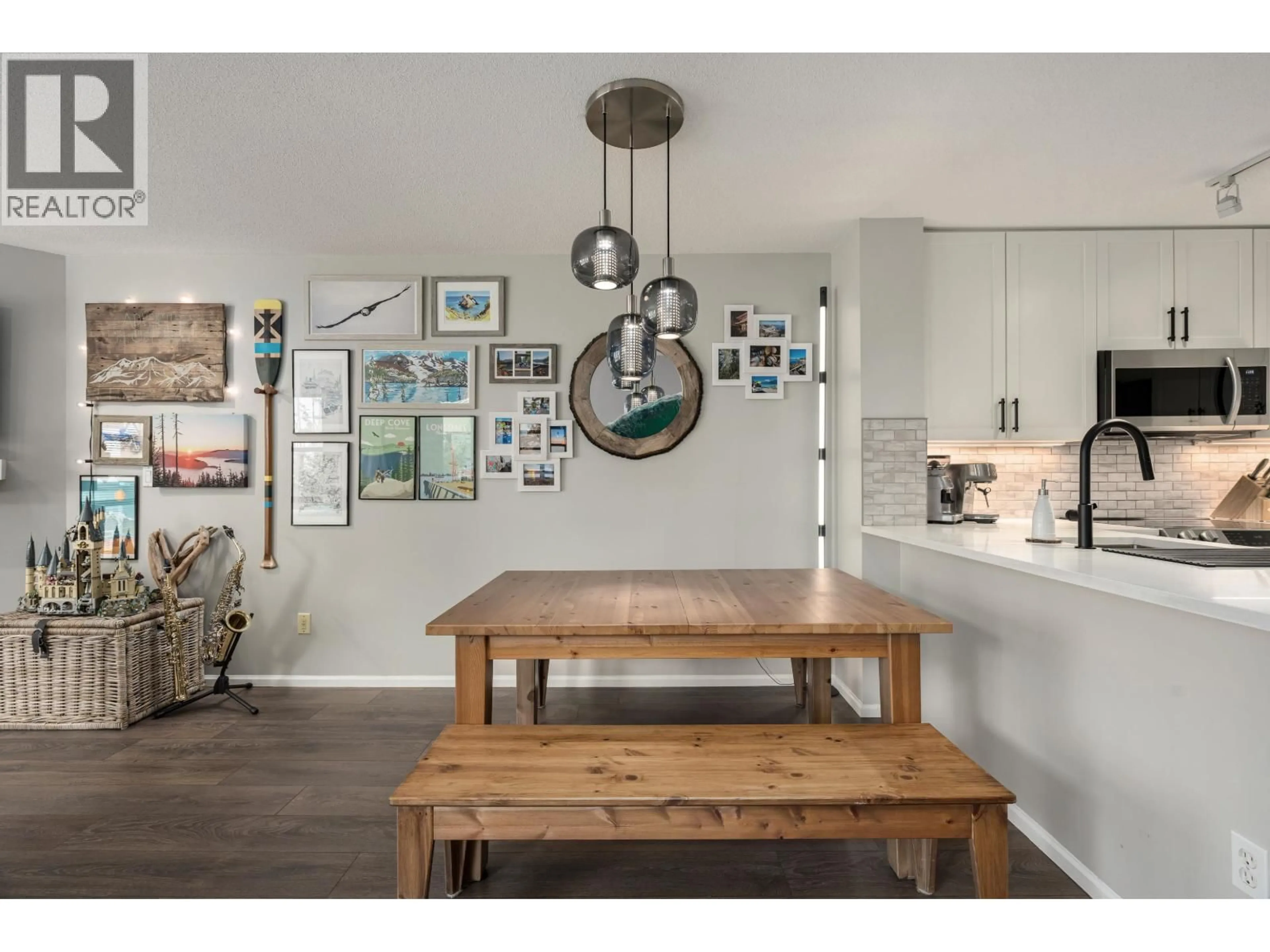 Open concept kitchen, wood/laminate floor for 305 - 124 3RD STREET, North Vancouver British Columbia V7M1E8