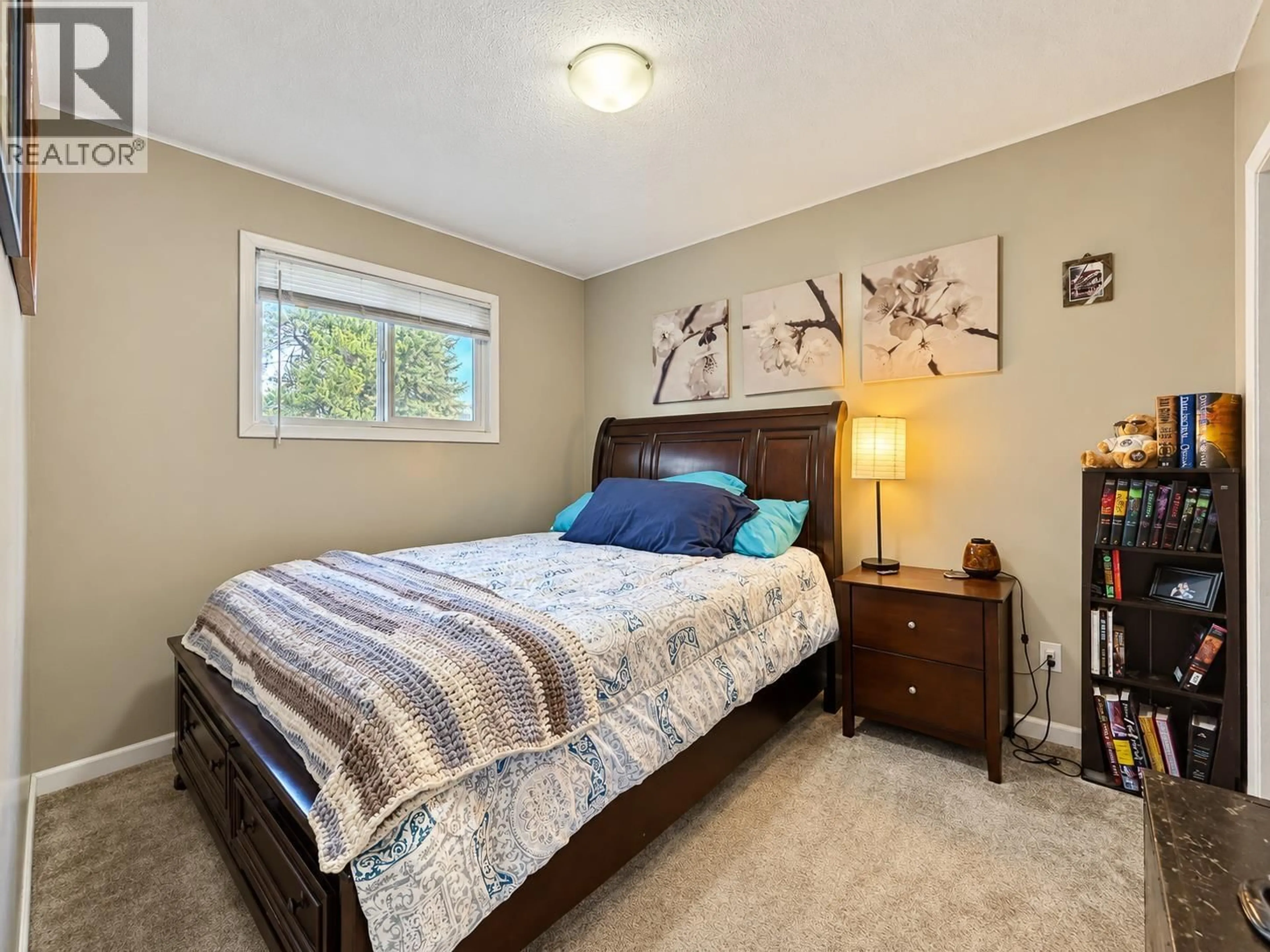 Bedroom with bed, carpet floor for 4075 FOURTH AVENUE, Smithers British Columbia V0J2N0