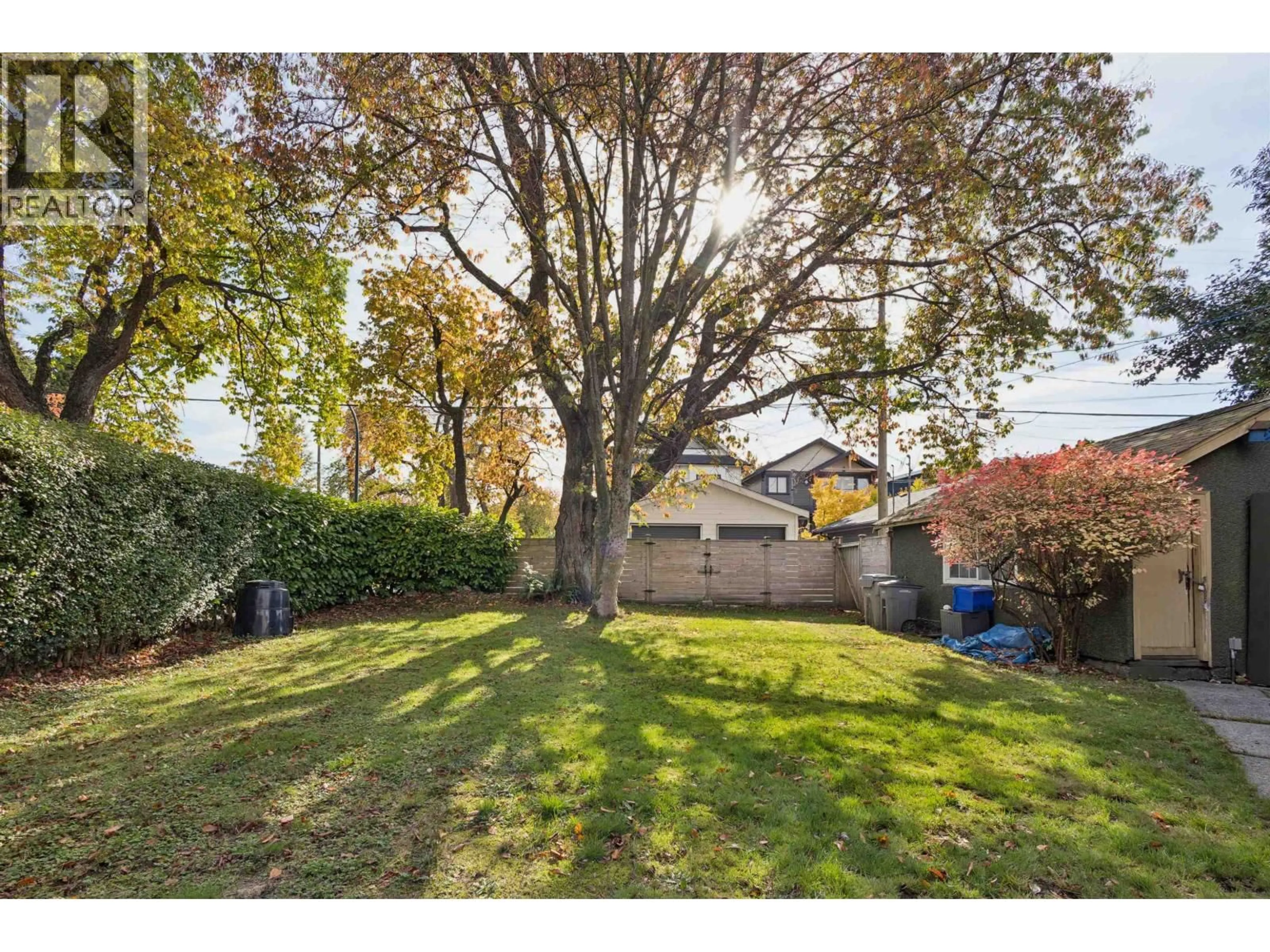 A pic from outside/outdoor area/front of a property/back of a property/a pic from drone, street for 75 SLOCAN STREET, Vancouver British Columbia V5K3M1