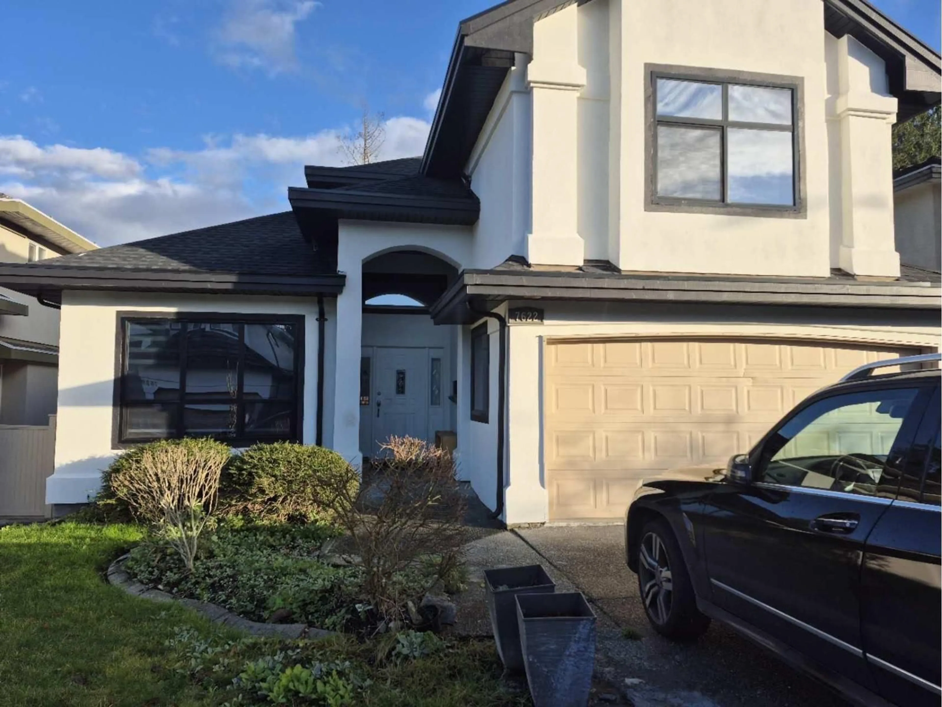 Home with vinyl exterior material, street for 7622 147A STREET, Surrey British Columbia V3S8Z3