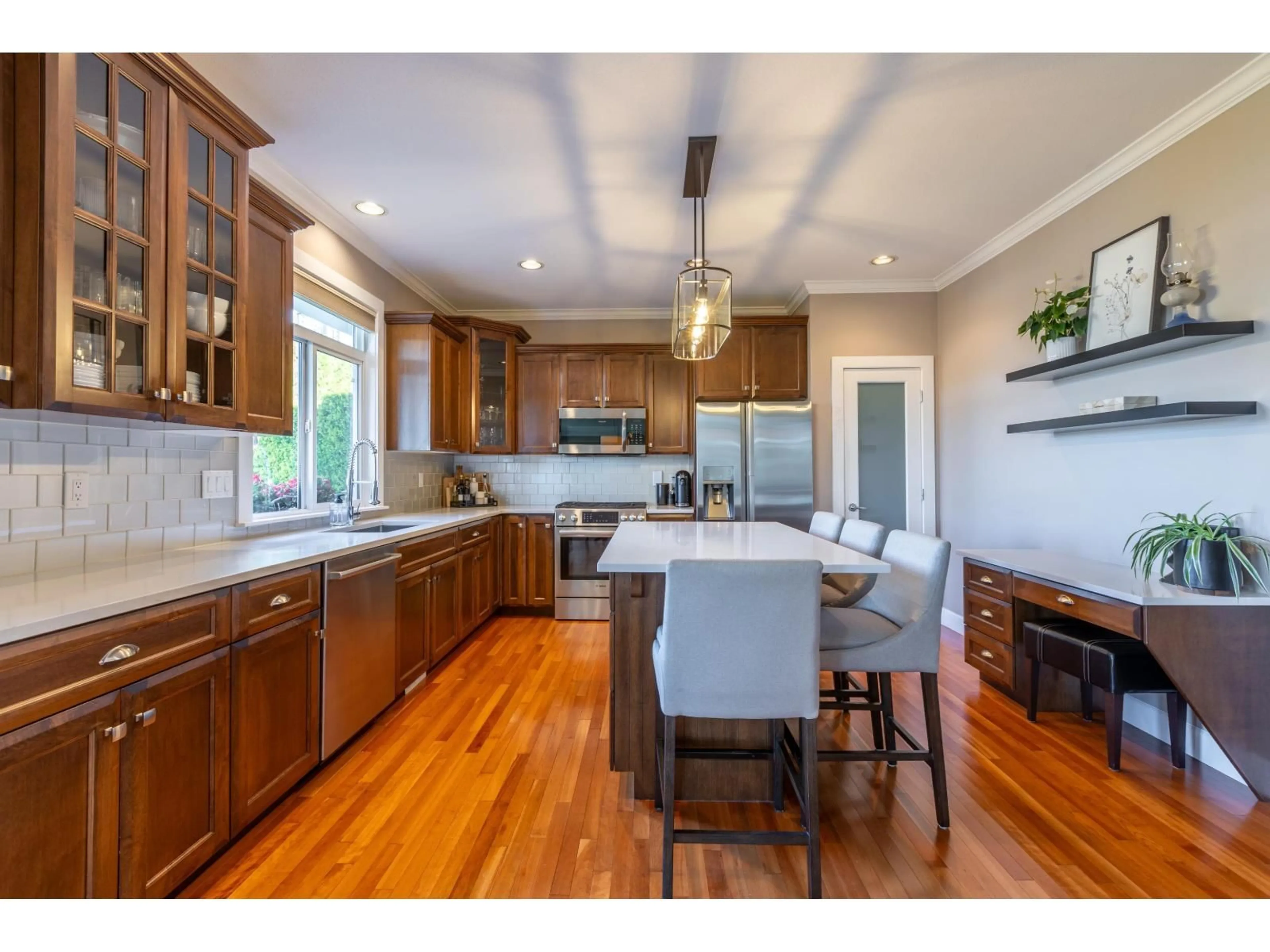 Open concept kitchen, wood/laminate floor for 3469 BLUEBERRY COURT, Abbotsford British Columbia V3G3C9